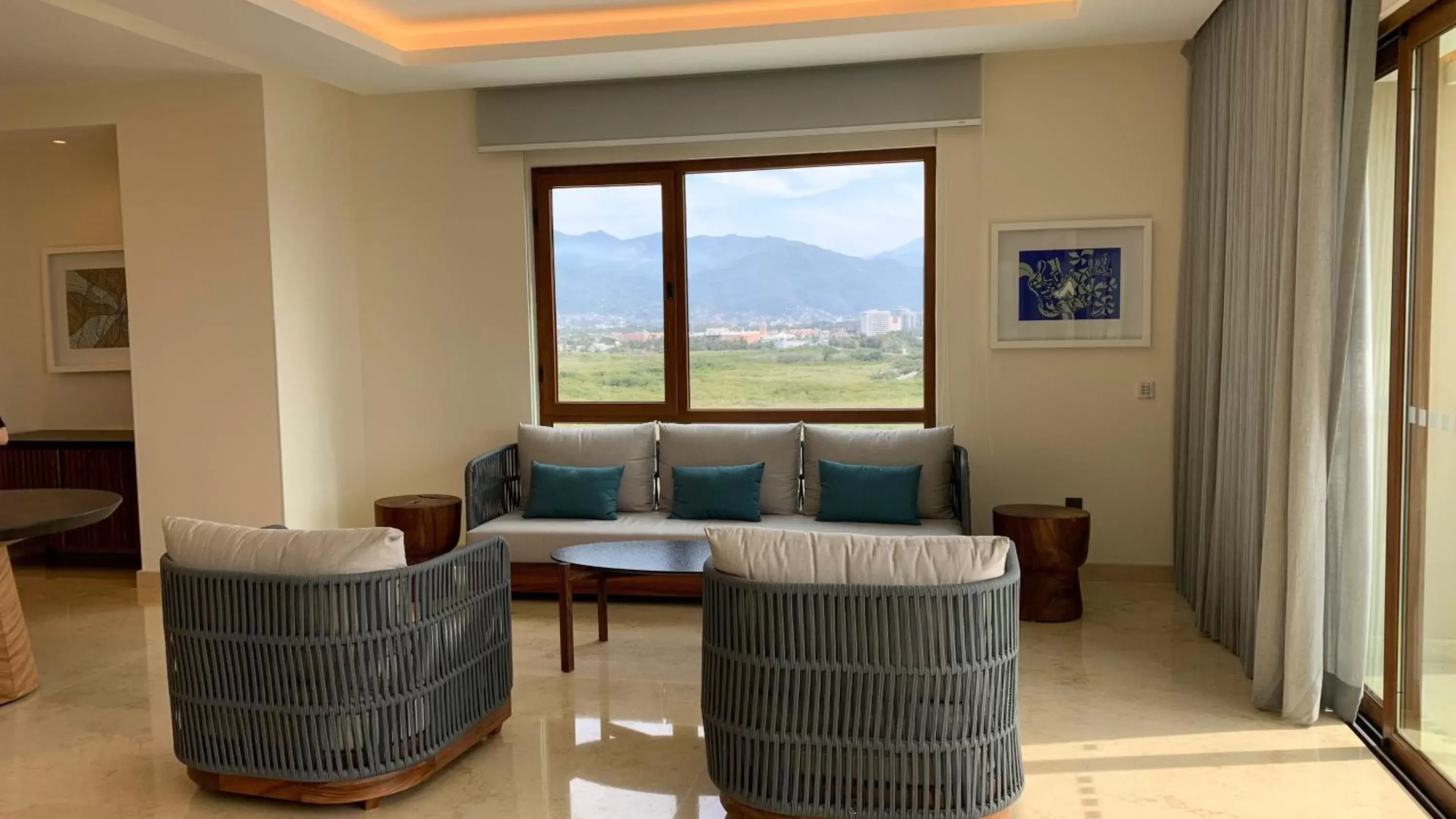 Photo of the whole room, Seating Area in Holiday Inn & Suites - Puerto Vallarta Marina & Golf, an IHG Hotel