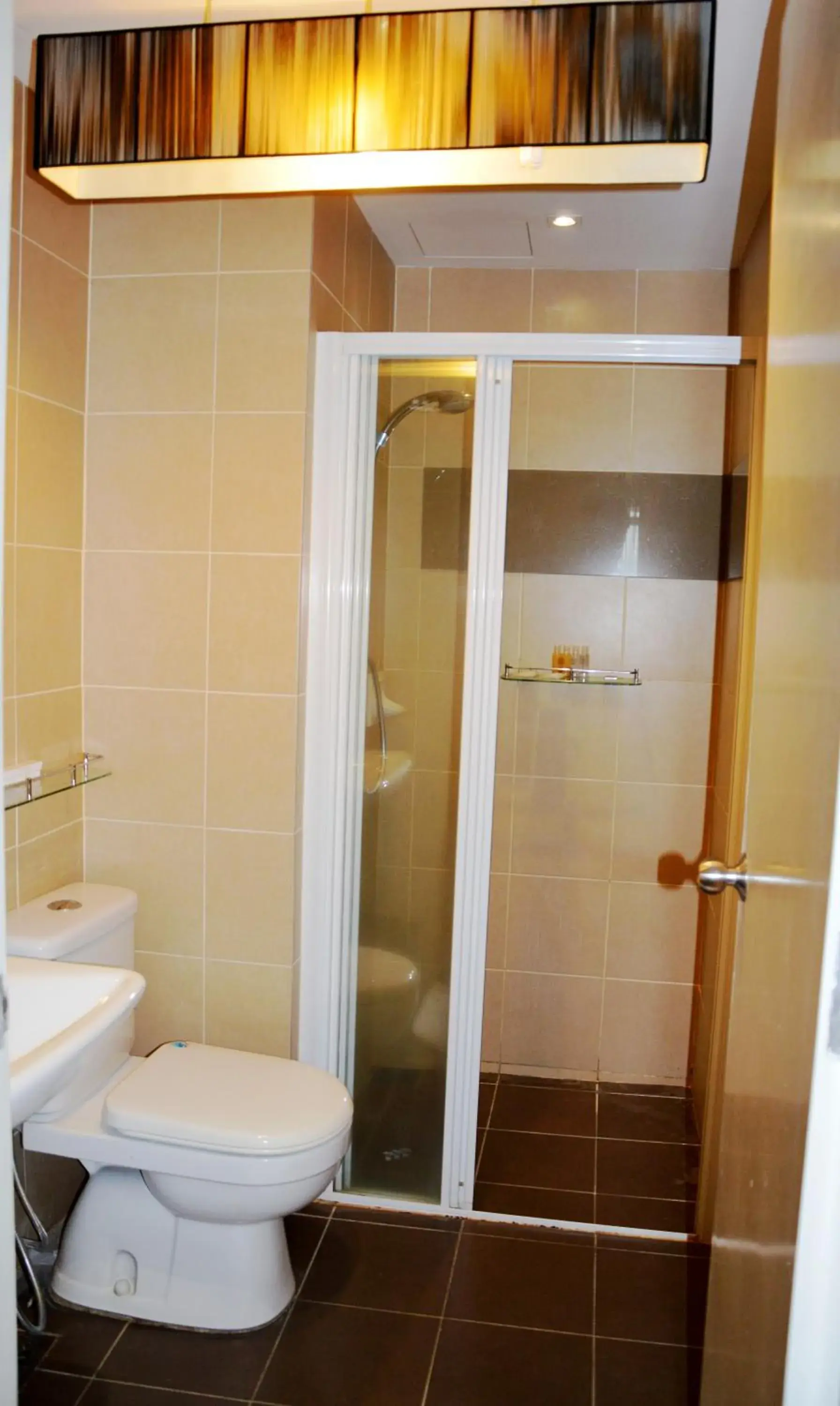 Toilet, Bathroom in Taragon Residences