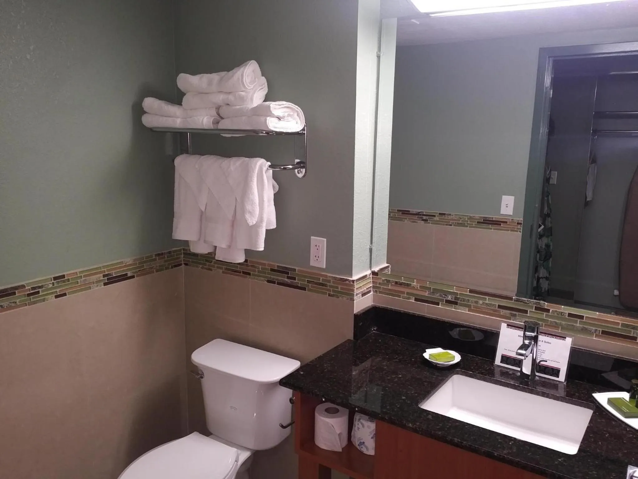 Toilet in Marble Waters Hotel & Suites, Trademark by Wyndham