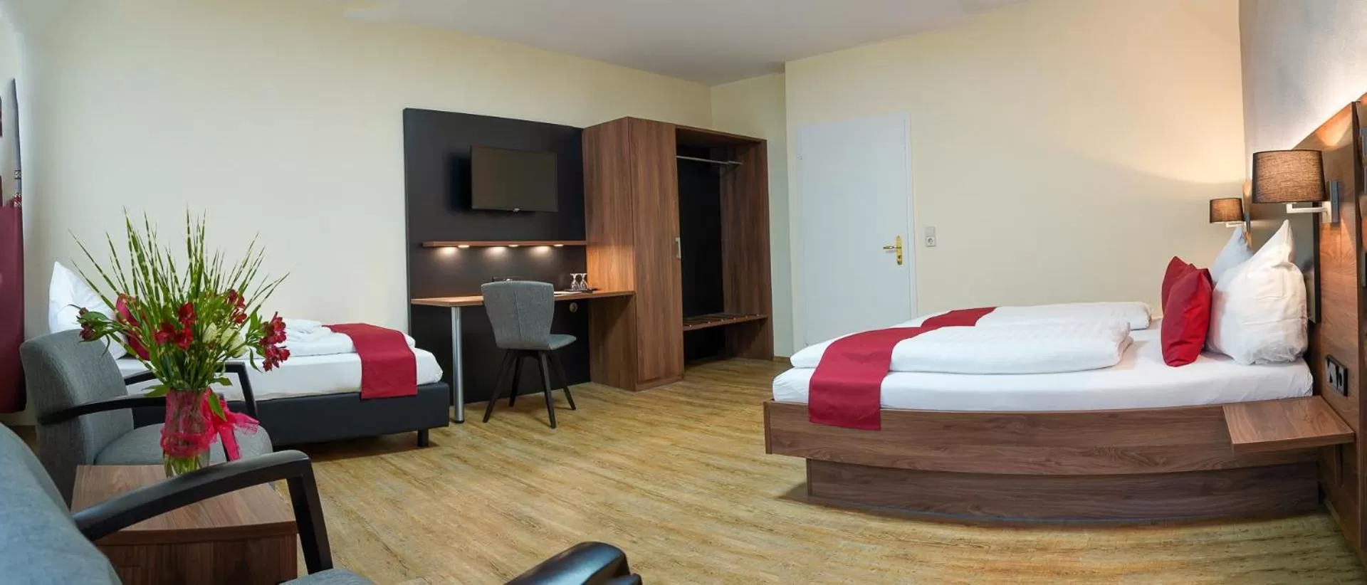 Communal lounge/ TV room, Bed in Brauerei Walter