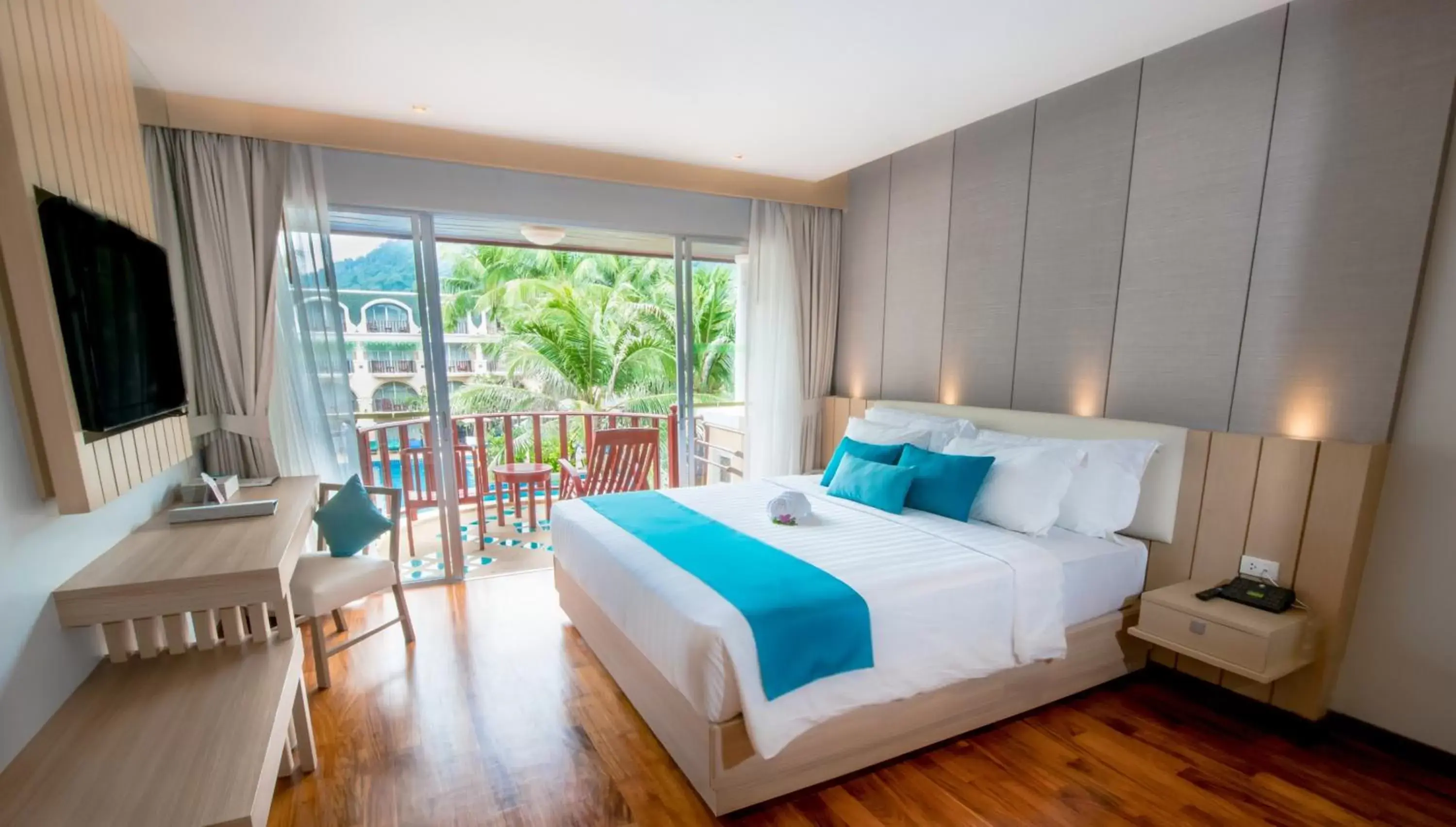 Bedroom in Phuket Graceland Resort and Spa - SHA Extra Plus