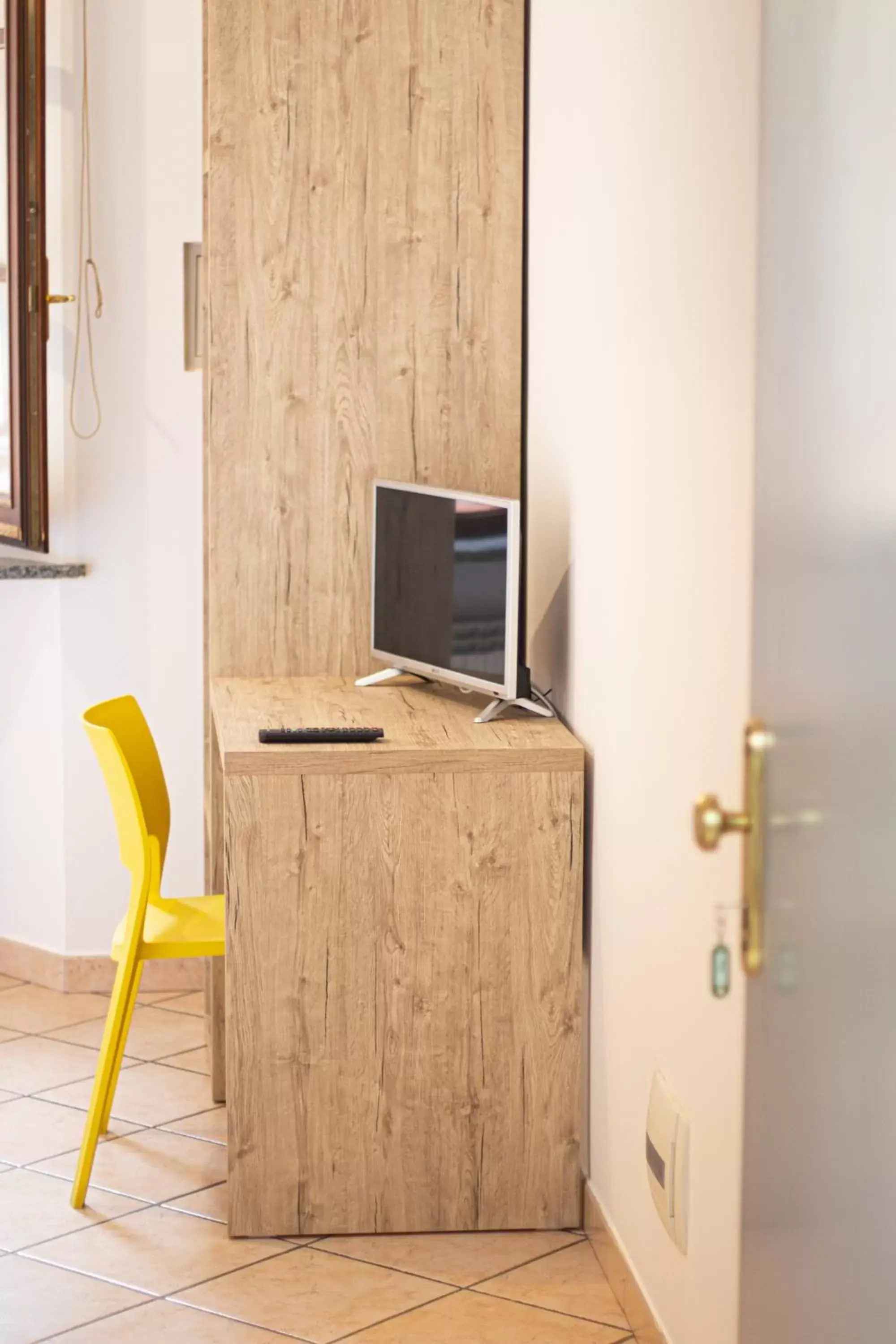 Bedroom, TV/Entertainment Center in Hotel Tornielli 9