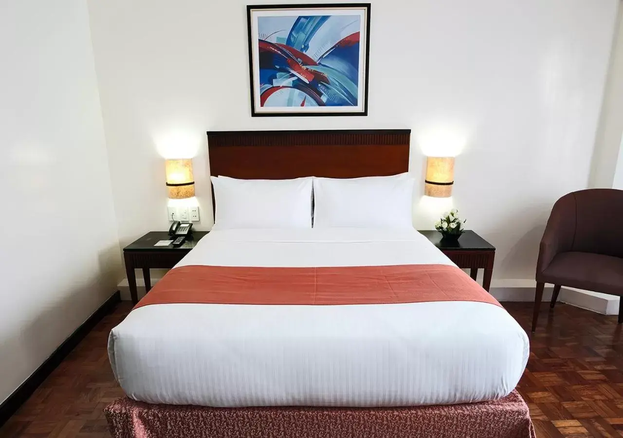 Bed in Fersal Hotel Neptune Makati