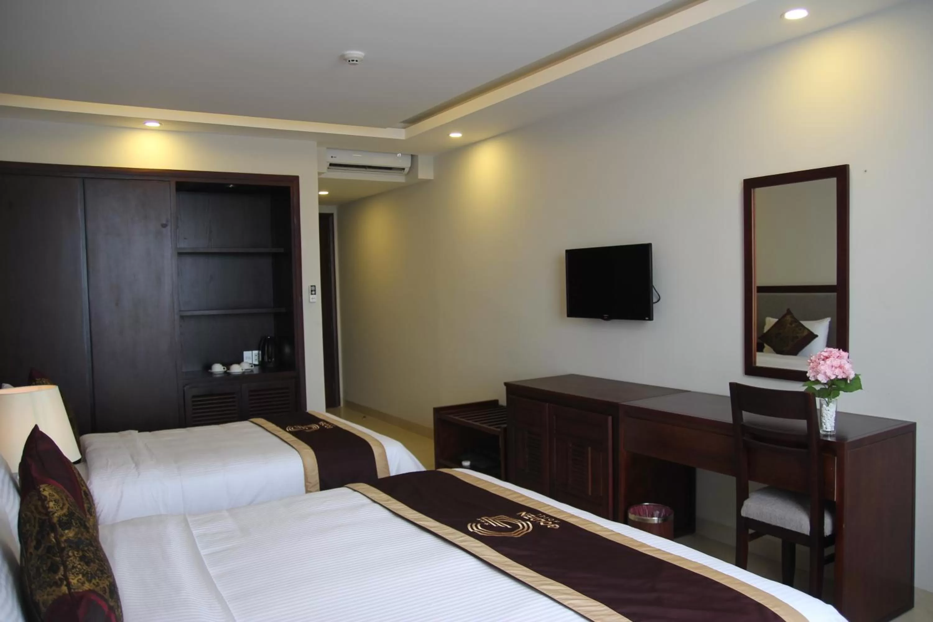 Bed in Golden Quang Tri Hotel