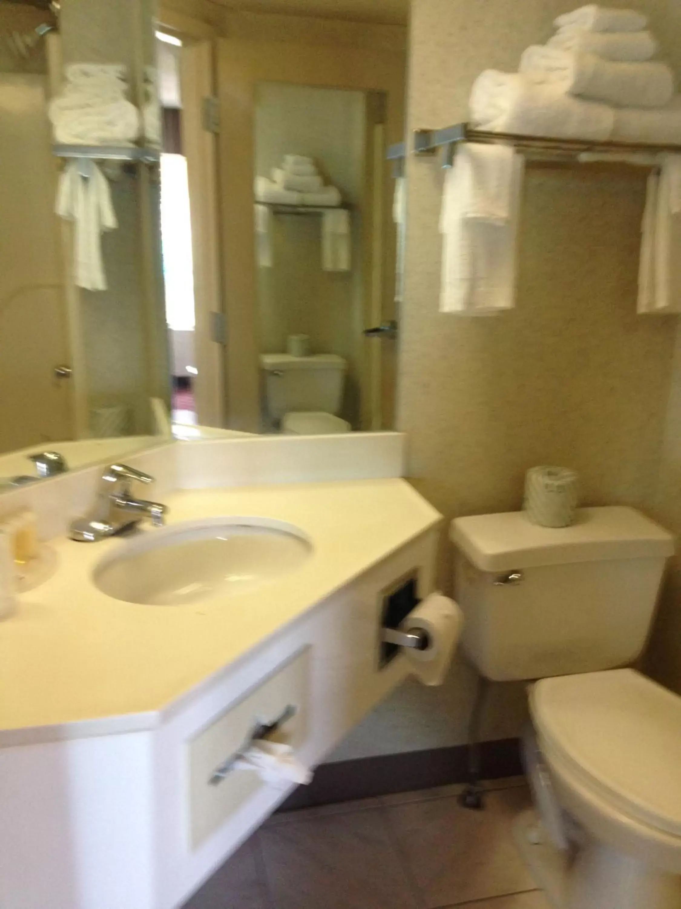 Bathroom in Days Inn & Suites by Wyndham Albany