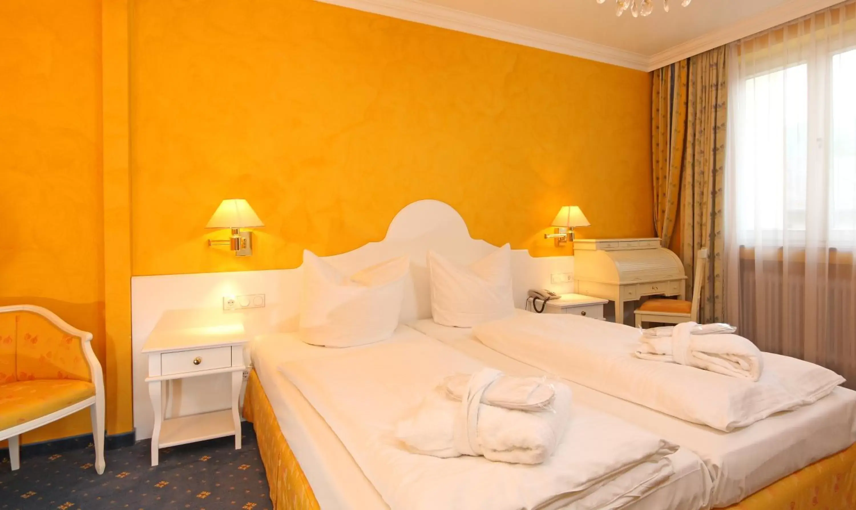 Bed in Wittelsbacher Hof Swiss Quality Hotel