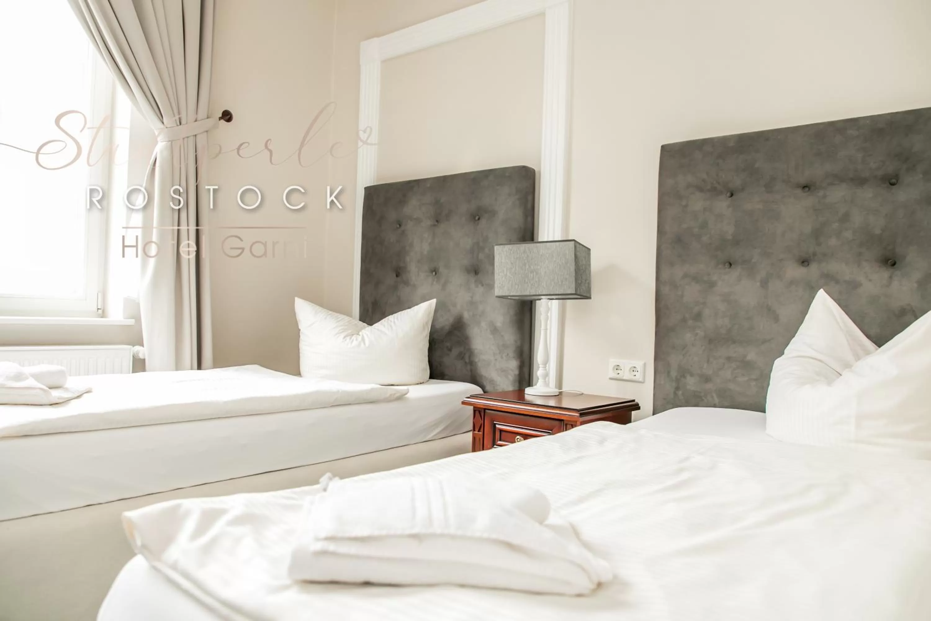 Photo of the whole room, Bed in Stadtperle Rostock