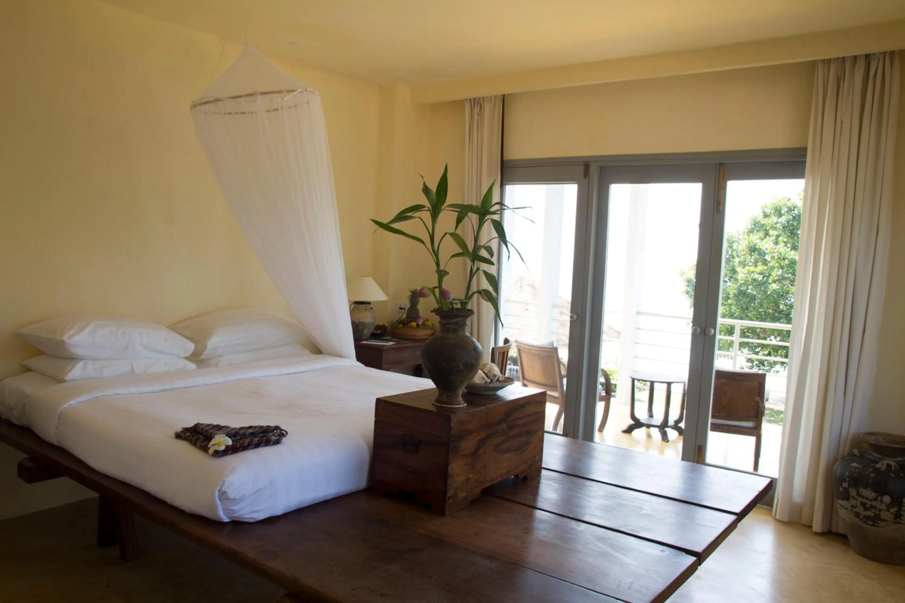 Bedroom, Bed in Knai Bang Chatt Resort