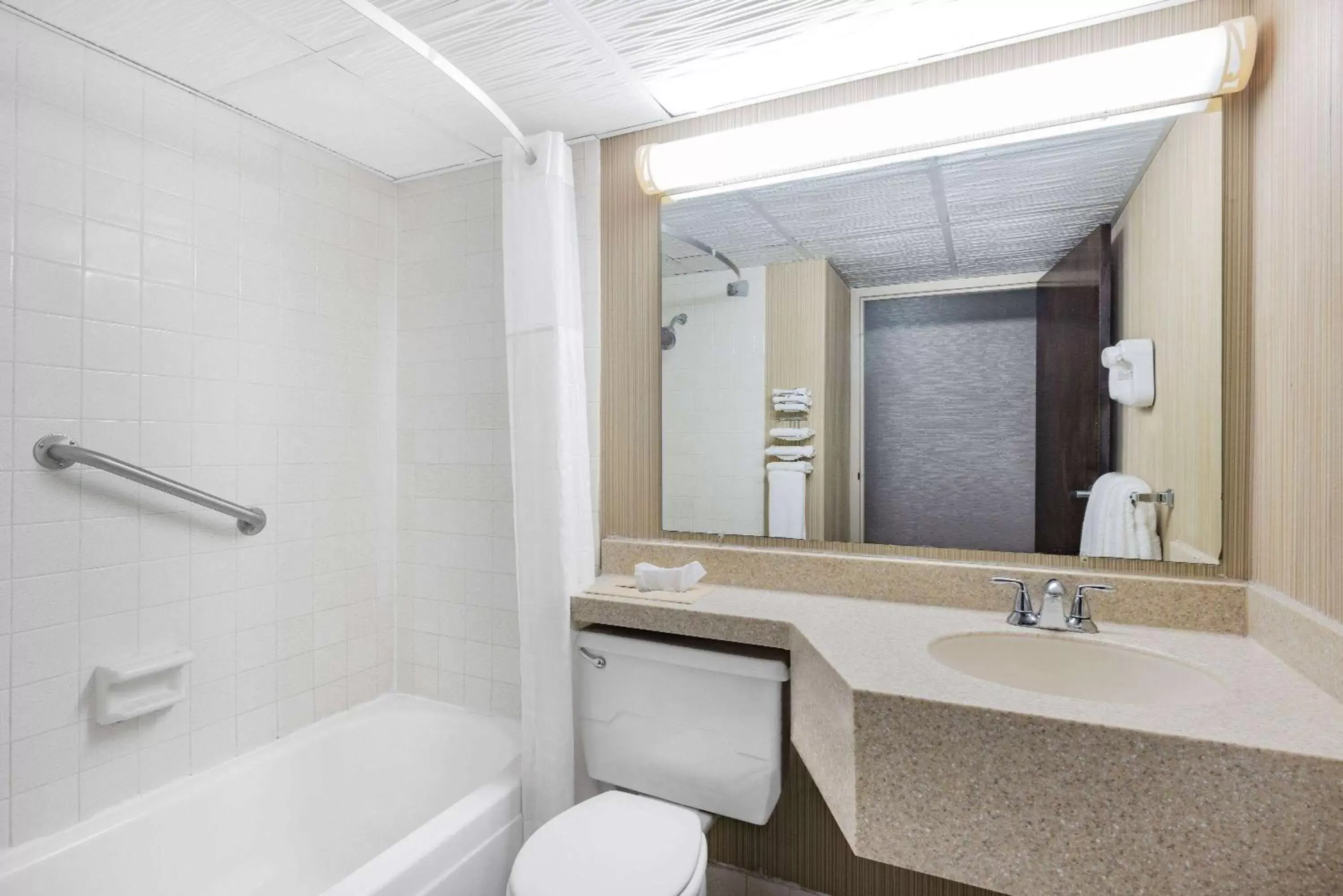TV and multimedia, Bathroom in Ramada by Wyndham Grand Forks