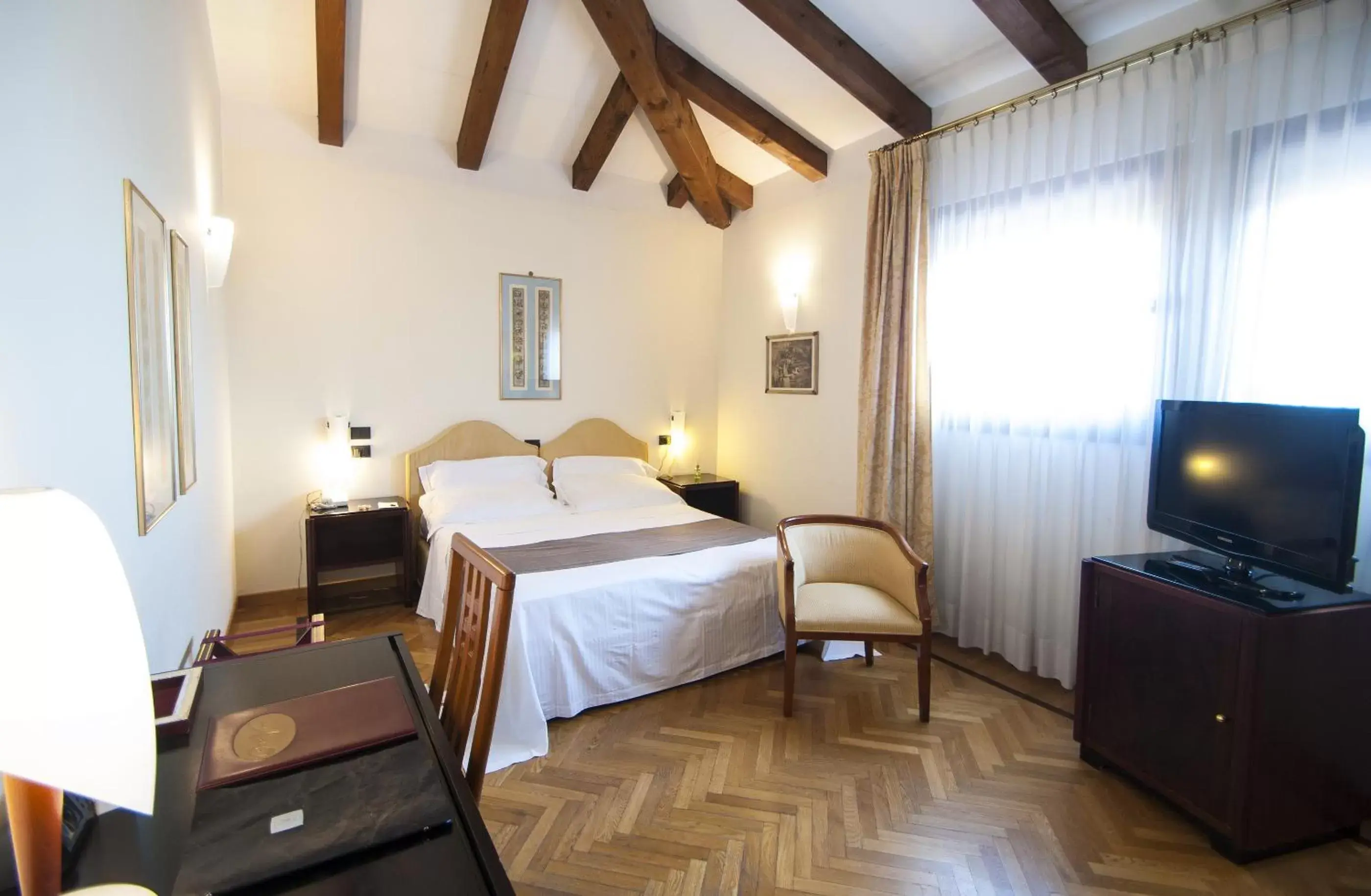 Photo of the whole room, Bed in Alla Rocca Hotel Conference & Restaurant