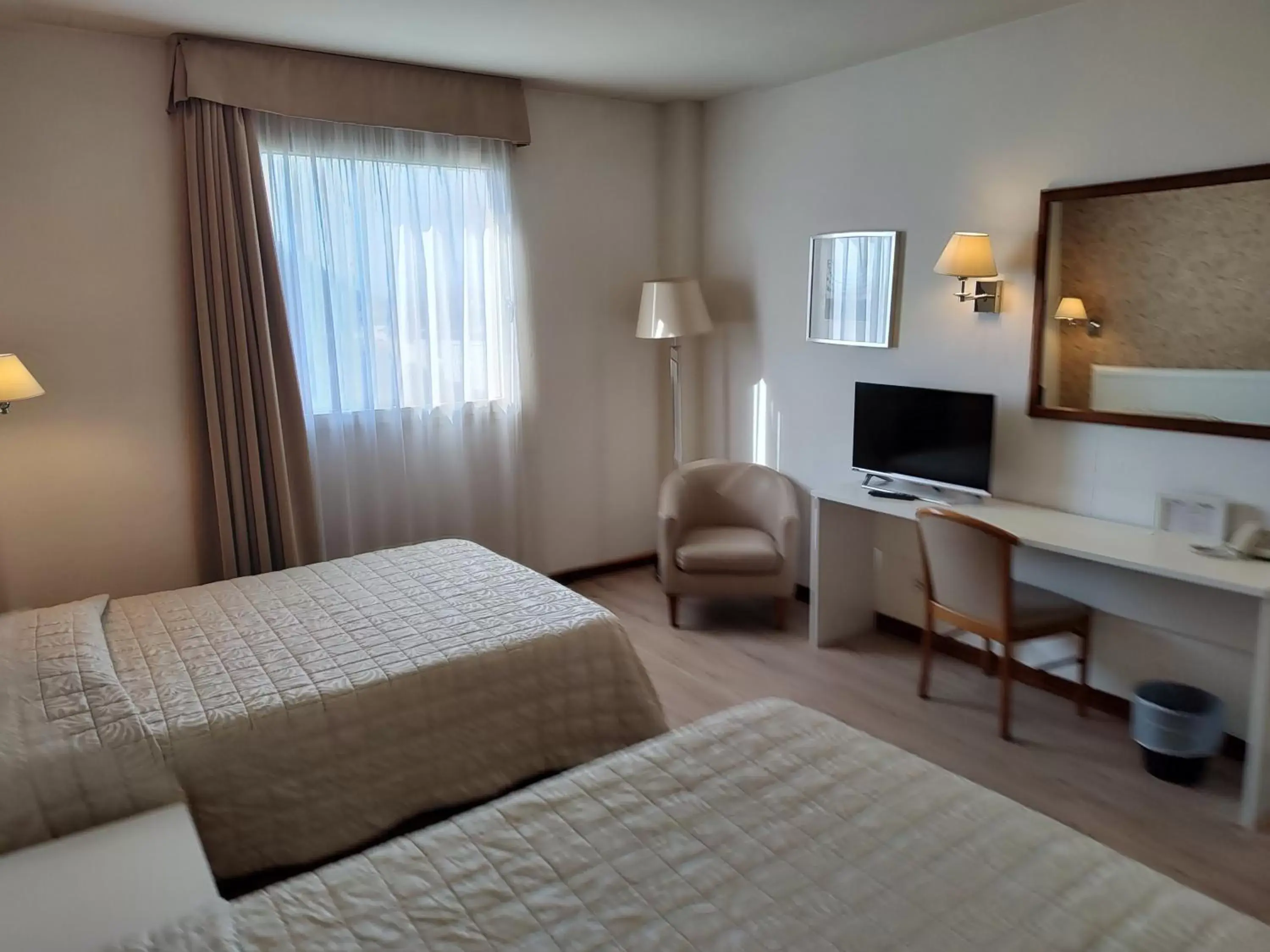 Bedroom, TV/Entertainment Center in Hotel Datini