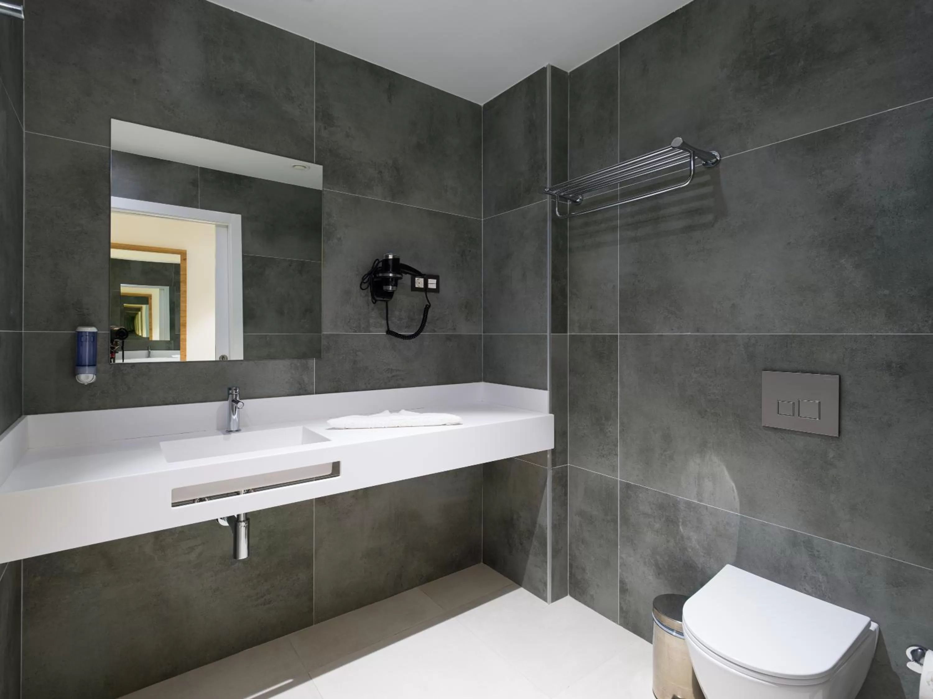 Bathroom in Hotel MG Poniente