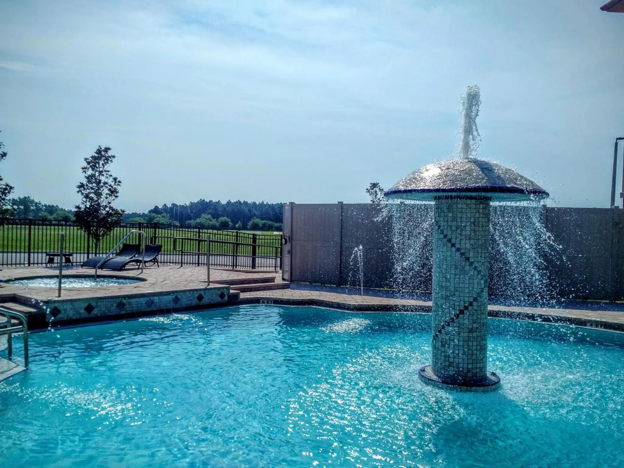 Swimming pool in Marble Waters Hotel & Suites, Trademark by Wyndham