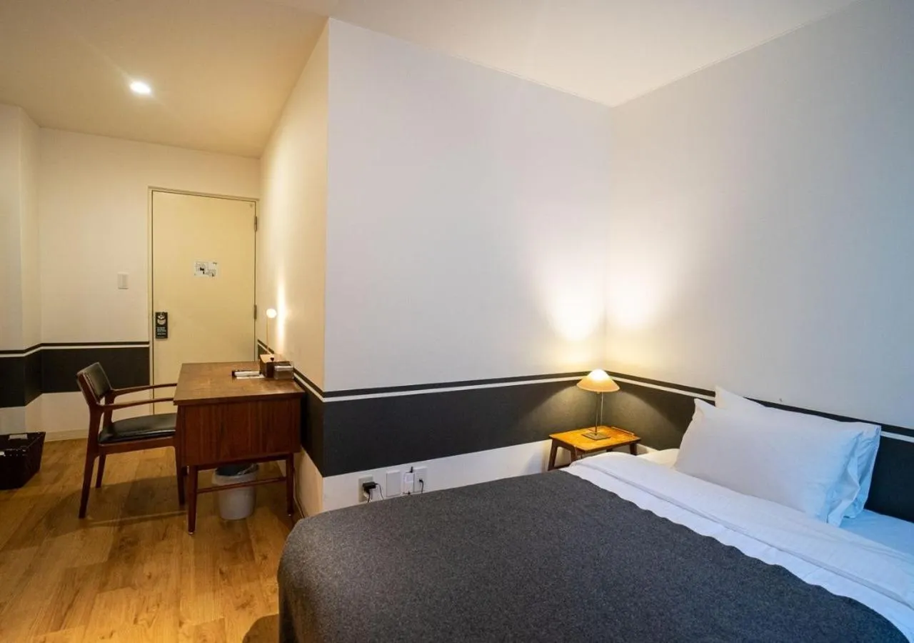 Bed in Hotel Graphy Nezu