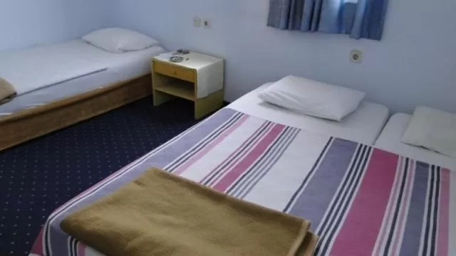 Bed in Sunrise Hotel