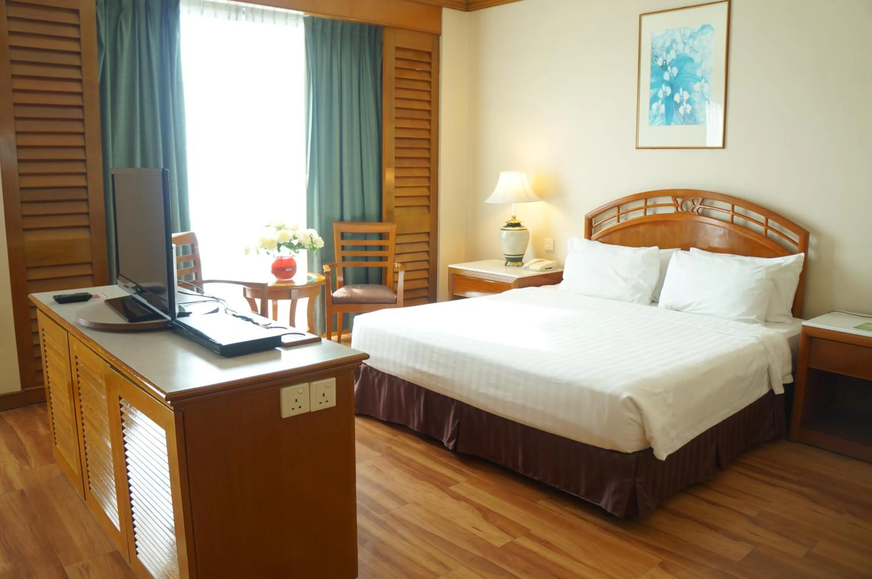 Bed in Sabah Oriental Hotel