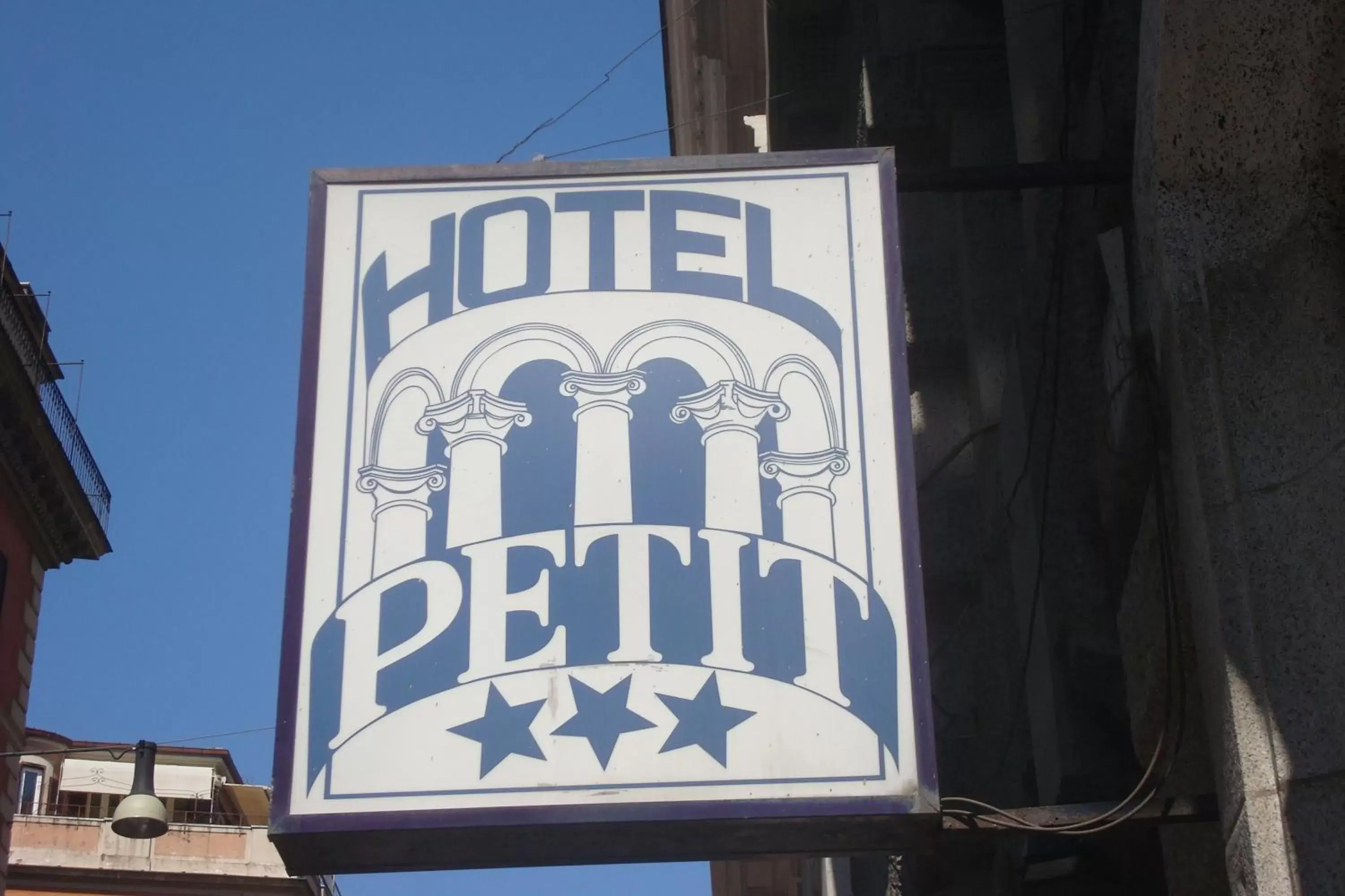 Property logo or sign in Hotel Le Petit