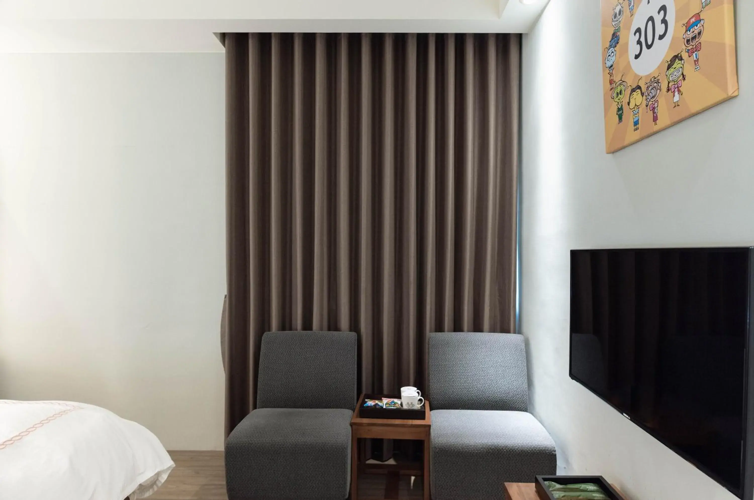 Bedroom, Seating Area in Tianli Hotel