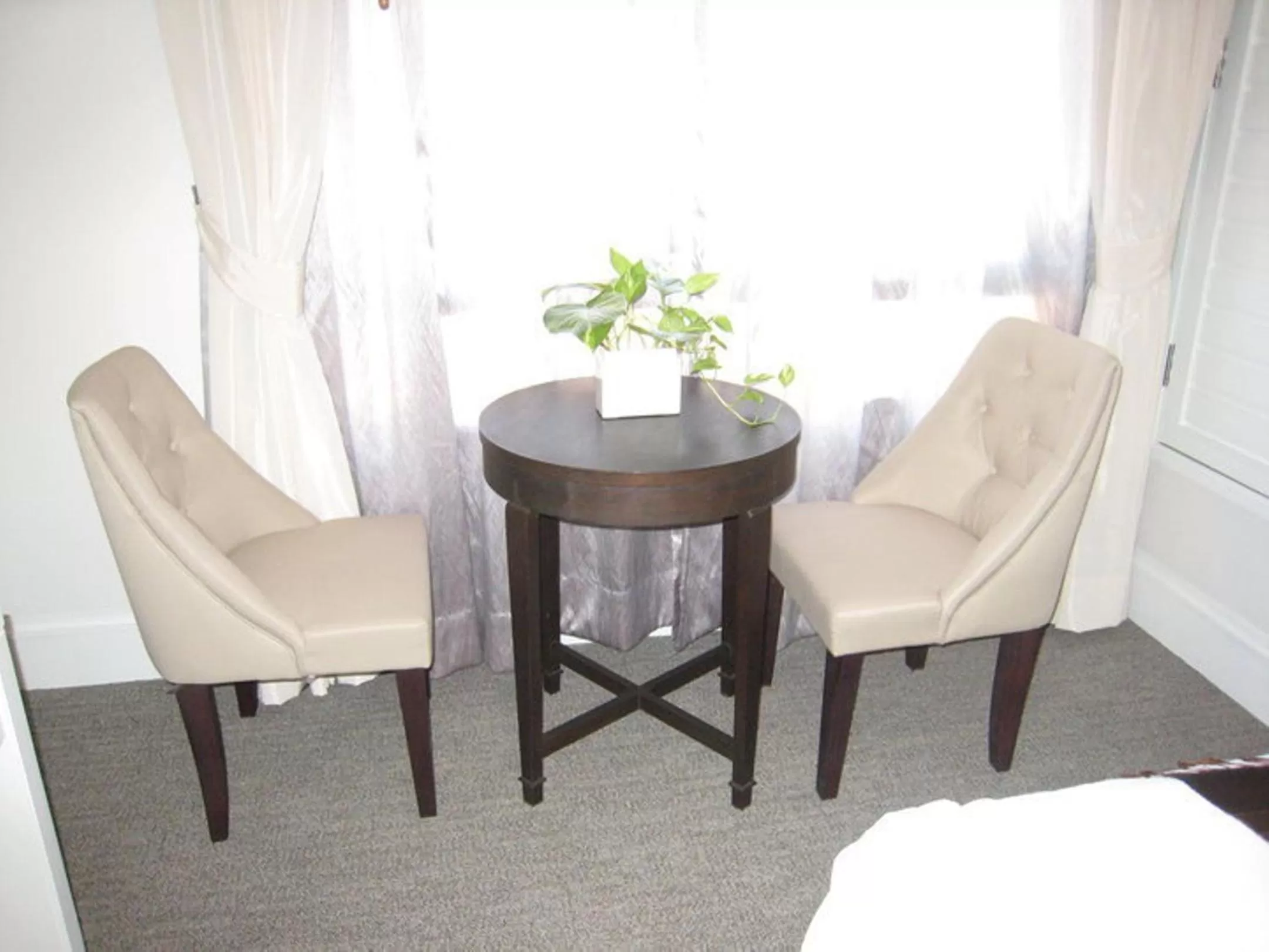 Seating area in Aphrodite Inn Bangkok