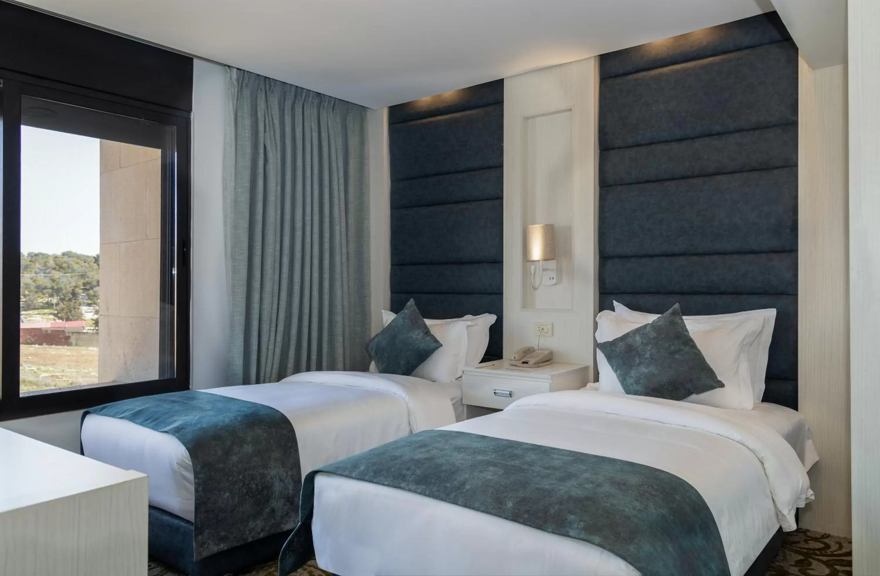 Bed in Opal Hotel Amman