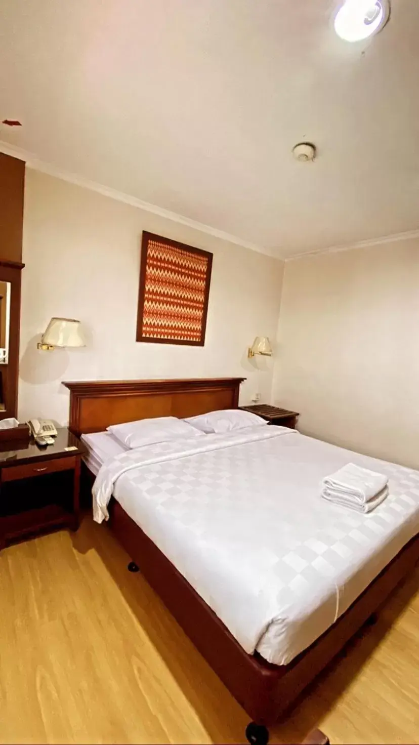 Bed in Cipta Hotel Wahid Hasyim