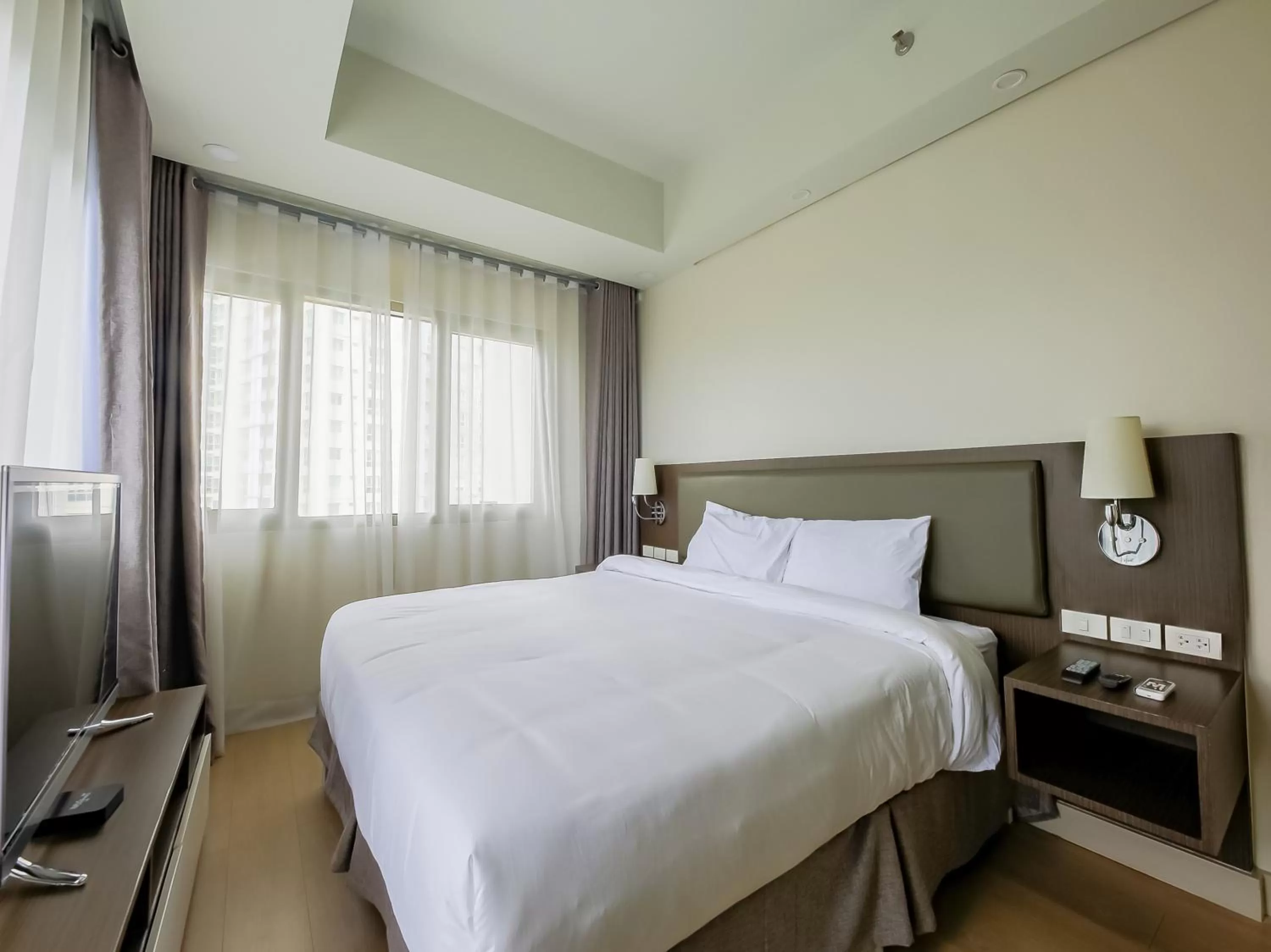 Bedroom, Bed in Capital O 804 The Residences at Bonifacio Civic Center