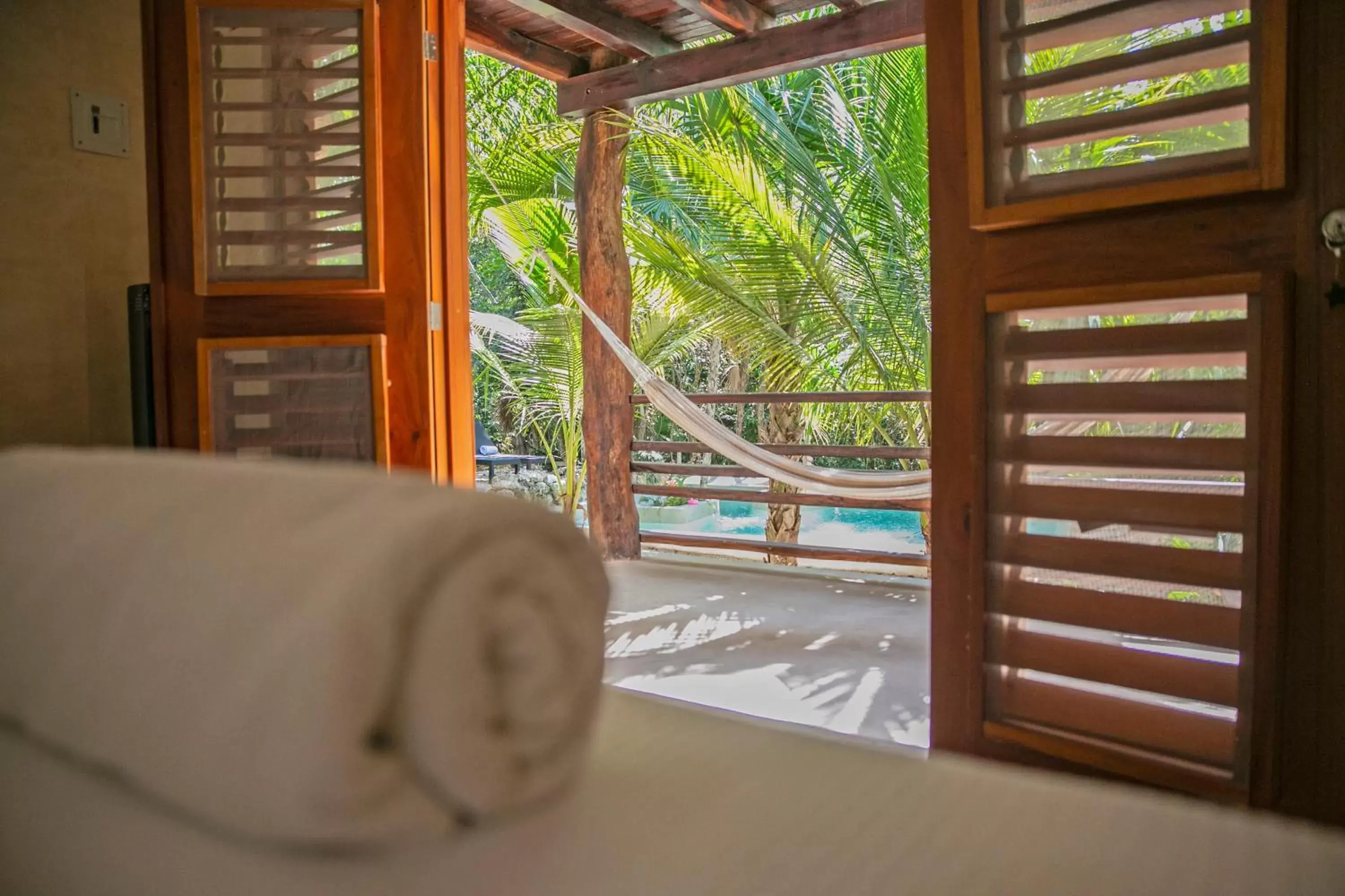 Photo of the whole room, Pool View in Hotel Buenavista Bacalar - Yoga & Meditation Included