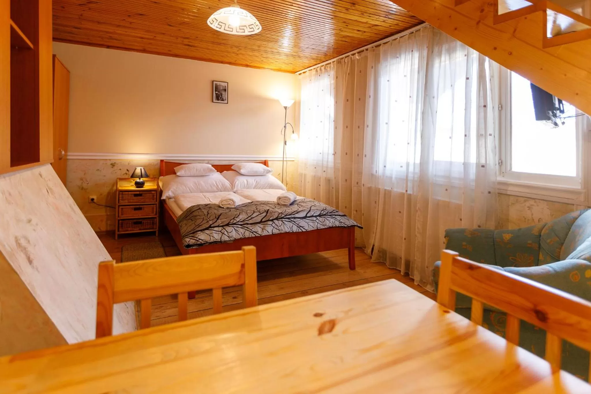 Photo of the whole room, Bed in Central Panzió Gyula