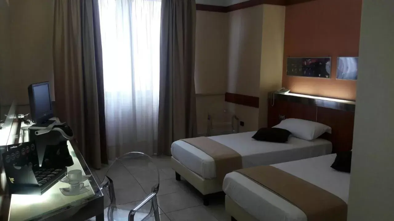 Bed in Hotel Artemide