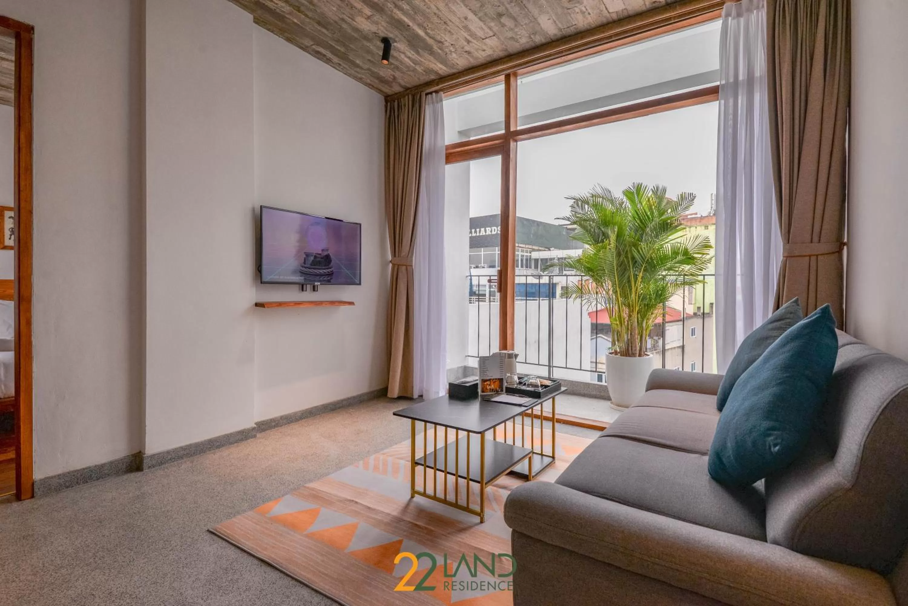 Communal lounge/ TV room in 22Land Hotel & Residence