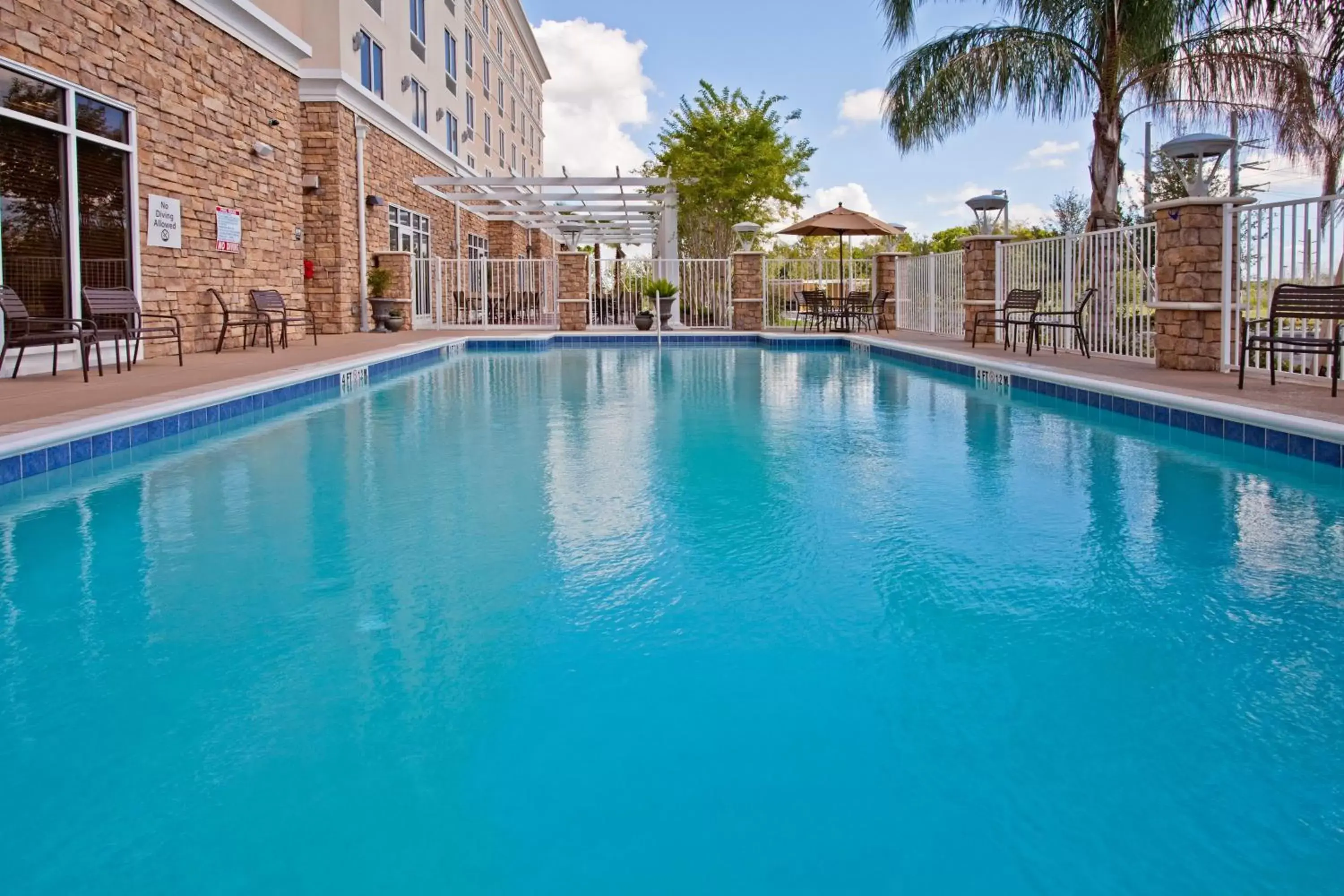 Swimming Pool in Holiday Inn Titusville/Kennedy Space Center, an IHG Hotel