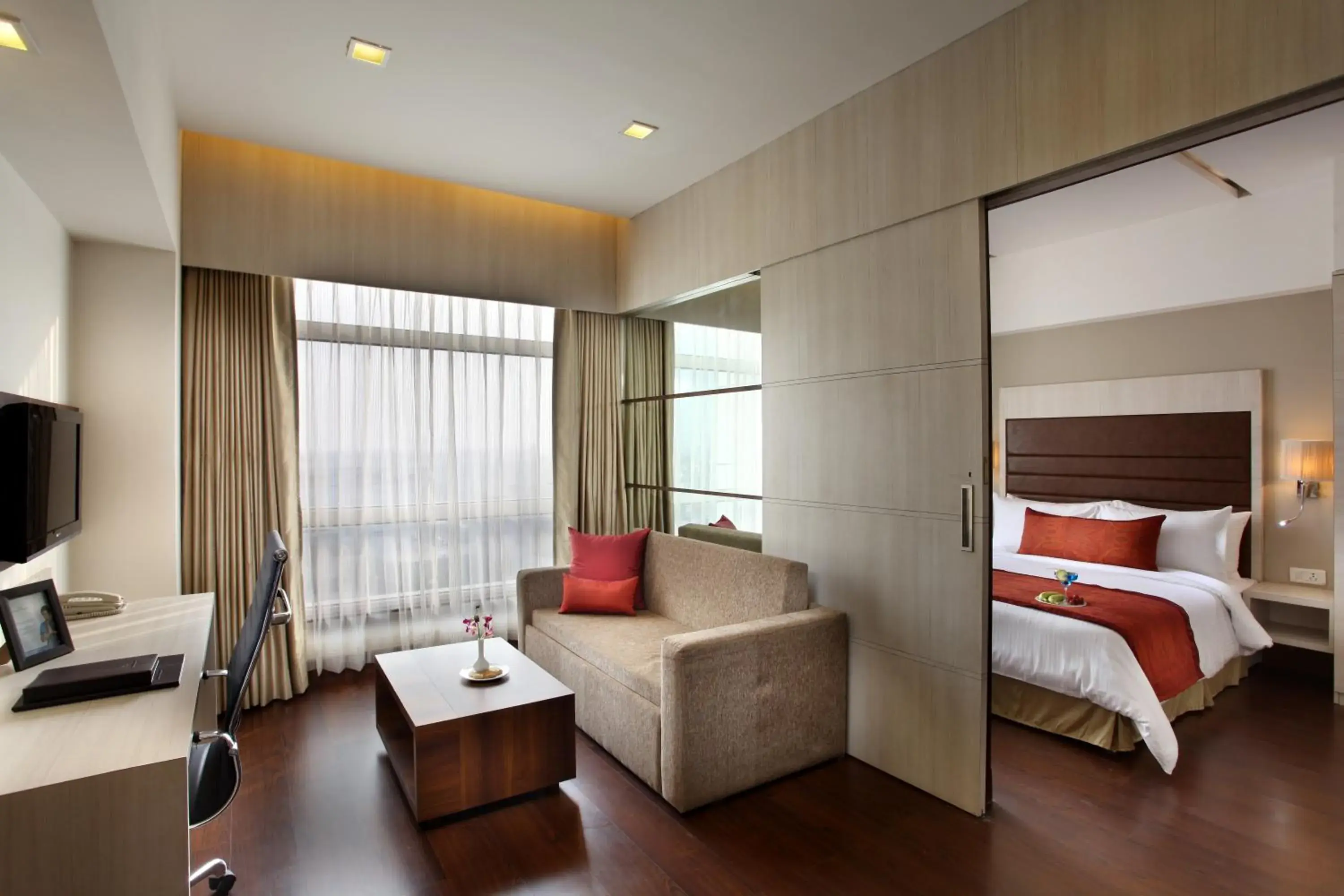 Living room in Mahagun Sarovar Portico Suites Ghaziabad