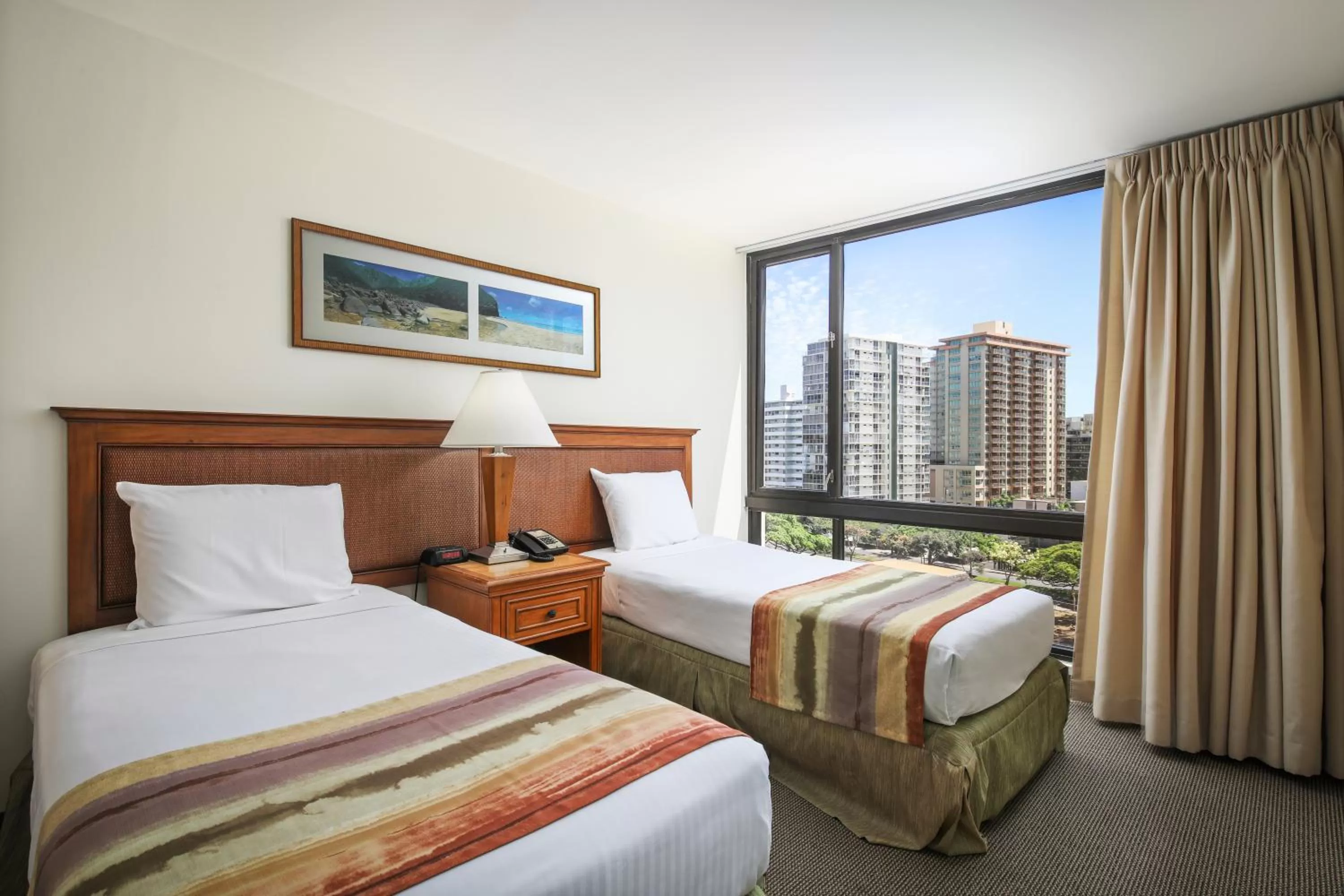 Bed in Aston Waikiki Sunset