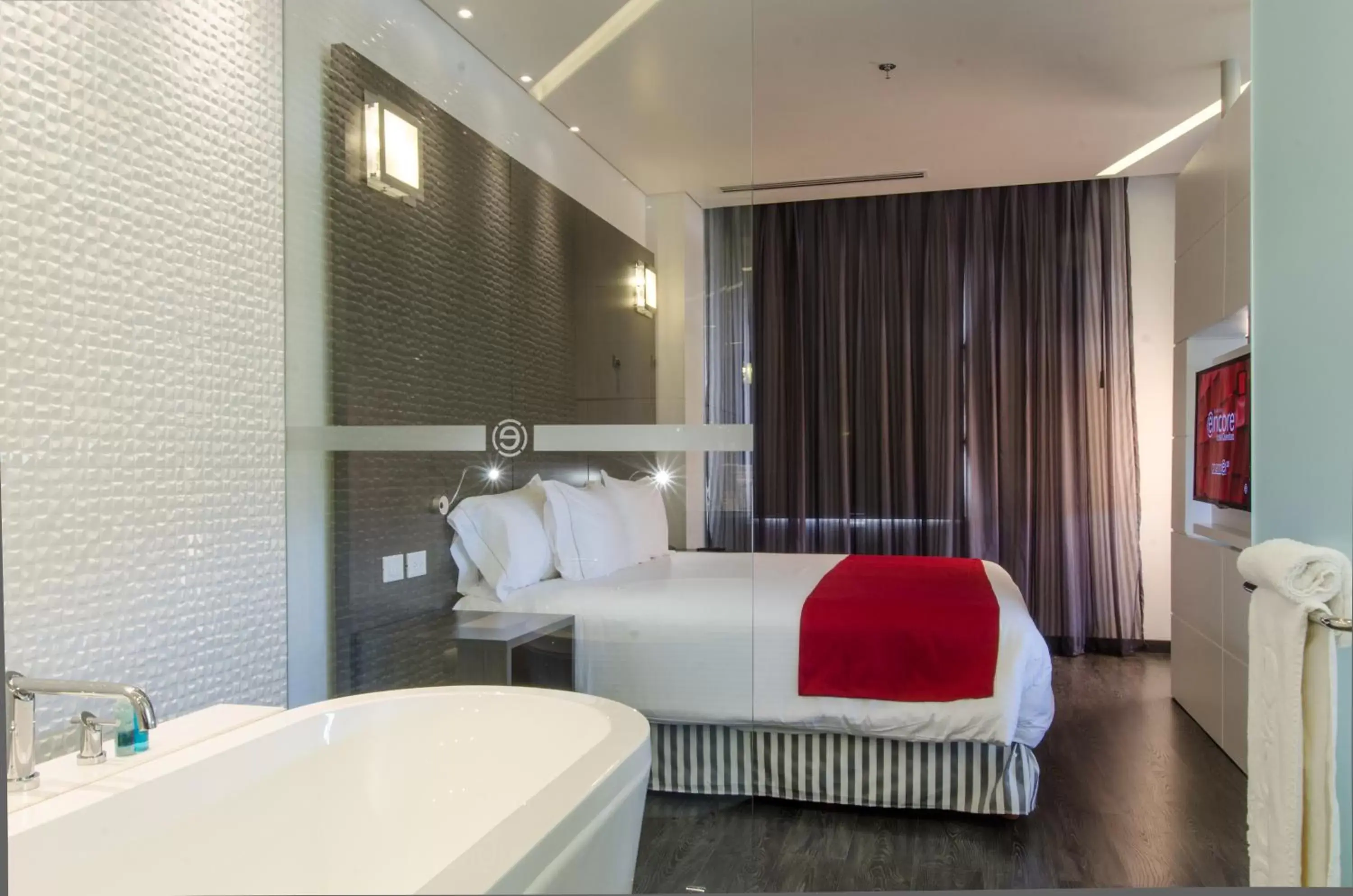 Bed, Bathroom in Ramada Encore by Wyndham San Luis Potosi