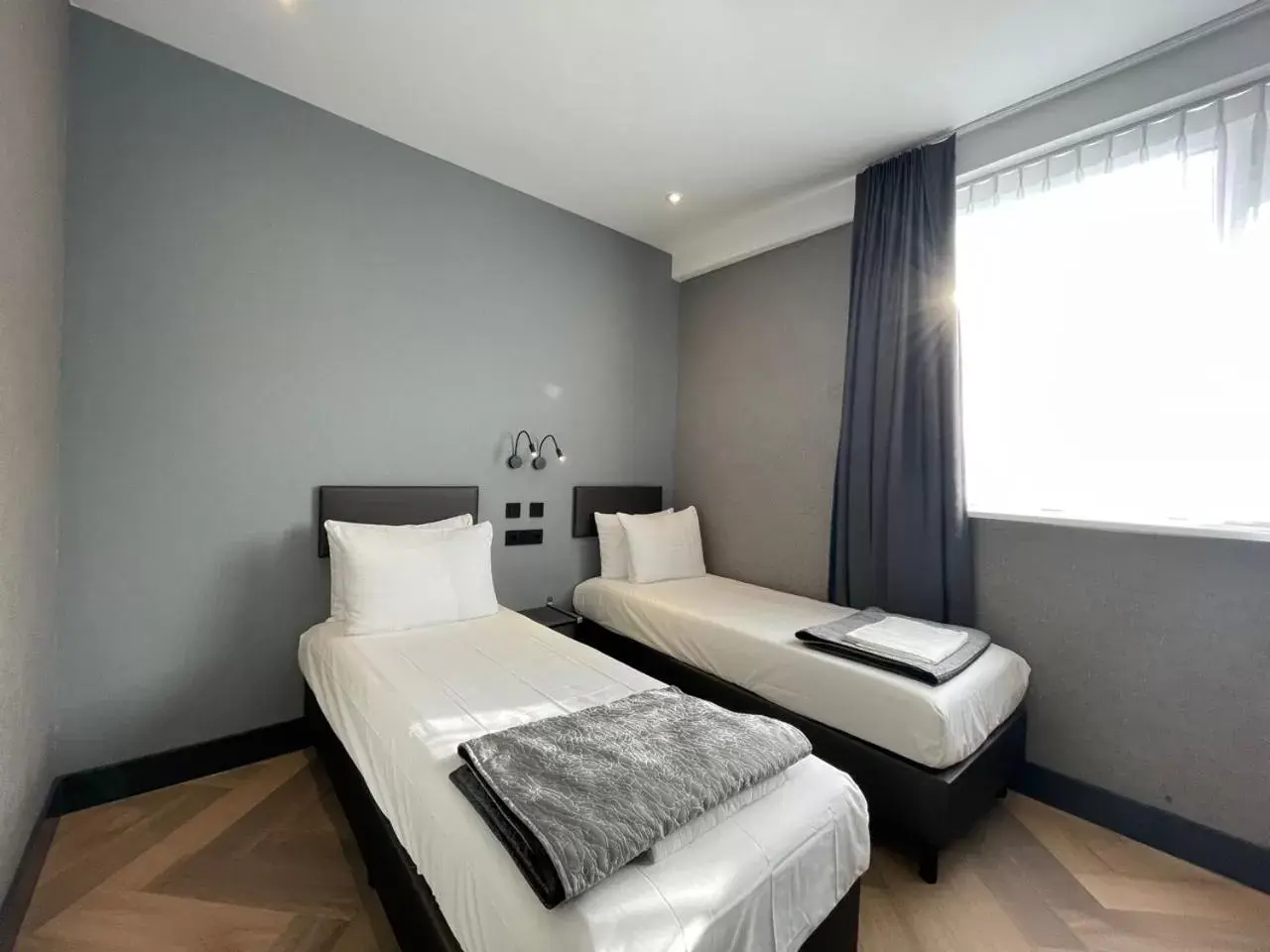 Bed in H3 Hotel Rotterdam City Center