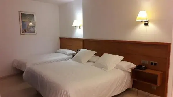 Bed in Hotel Octavia