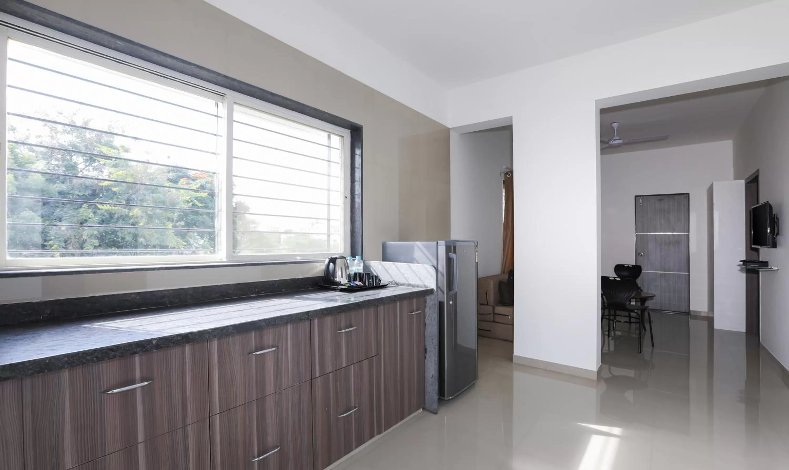 Kitchen or kitchenette in Treebo Sapphire Studio