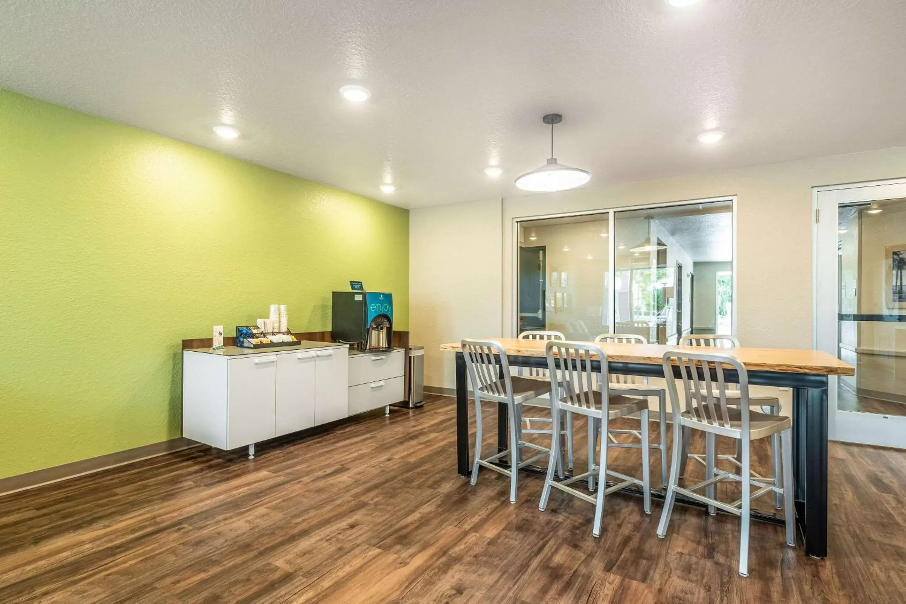 Lobby or reception, Dining Area in WoodSpring Suites Sanford North I-4 Orlando Area