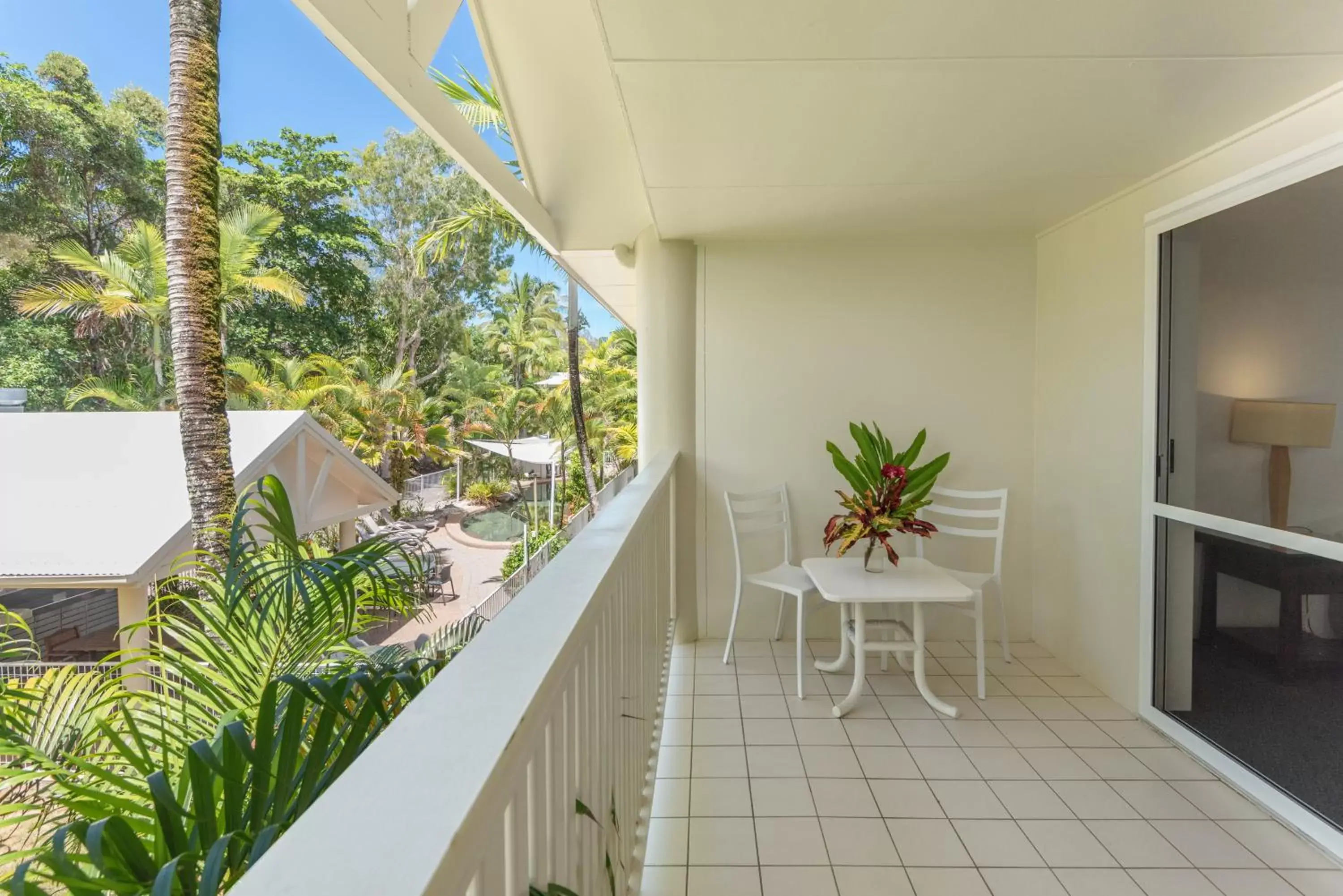 Swimming pool, Balcony/Terrace in Tropical Nites Holiday Townhouses