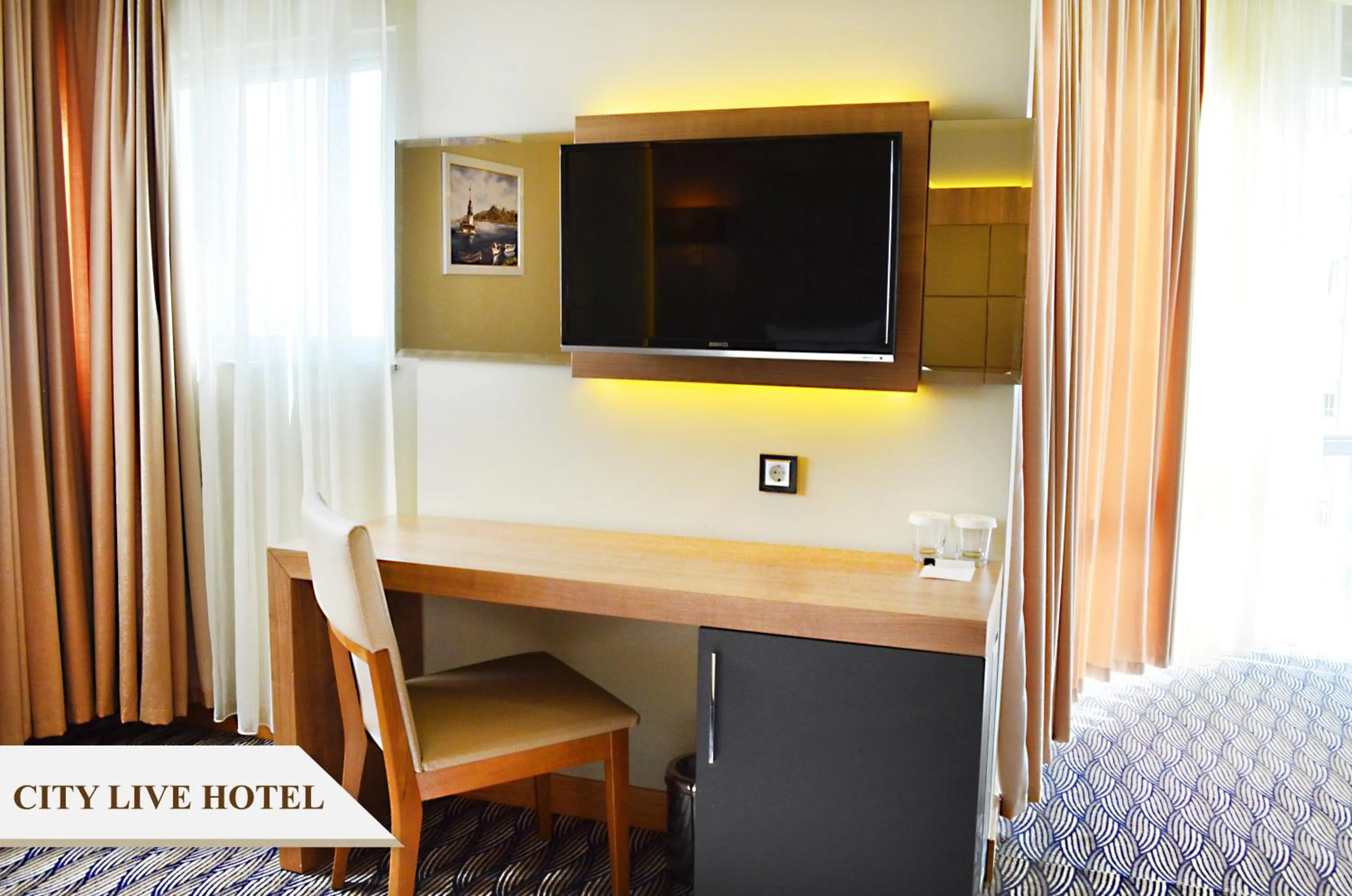 Photo of the whole room in City Live Hotel