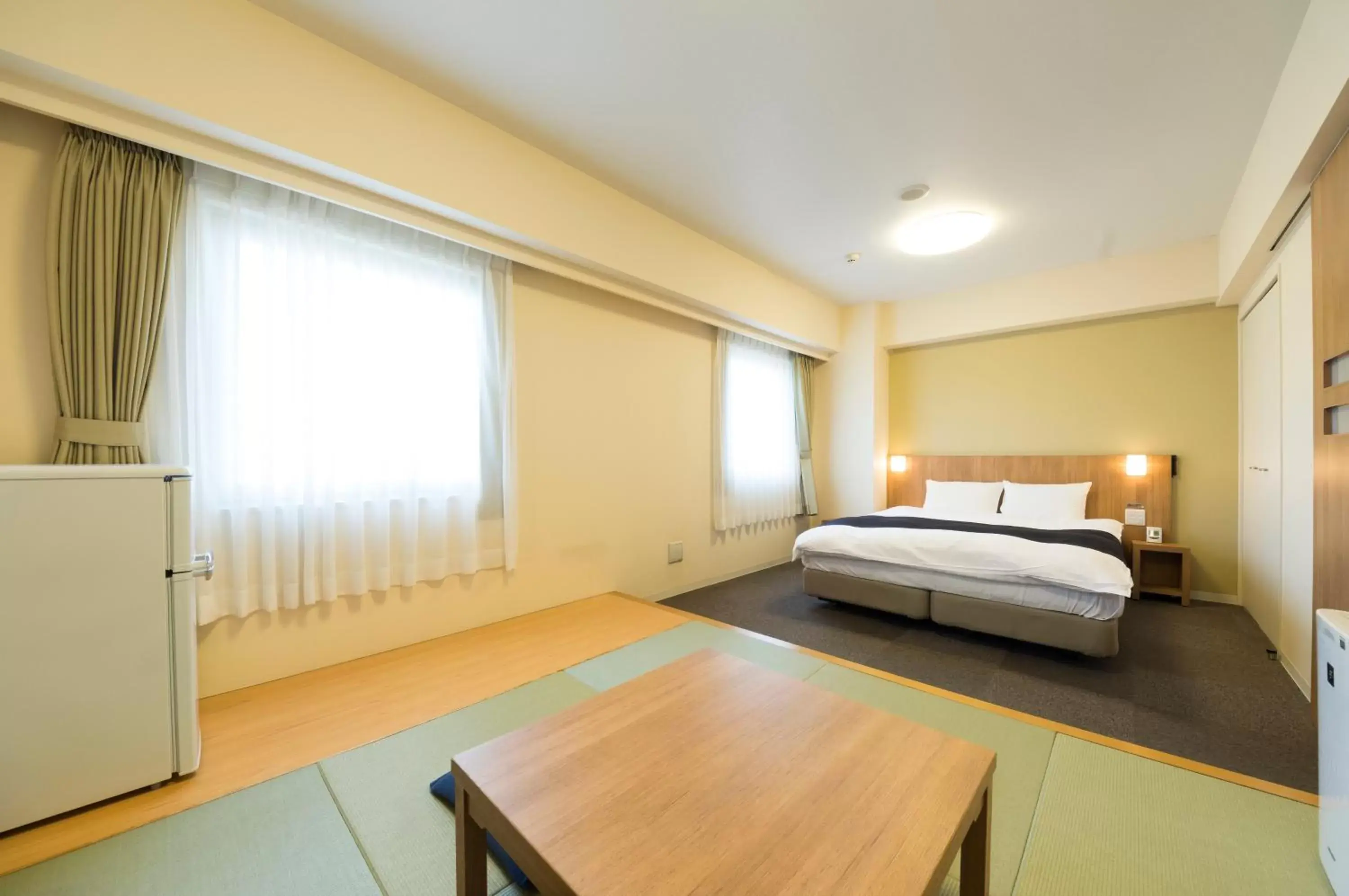 Bed in Dormy Inn Express Mikawaanjo Bed in Dormy Inn Express Mikawaanjo