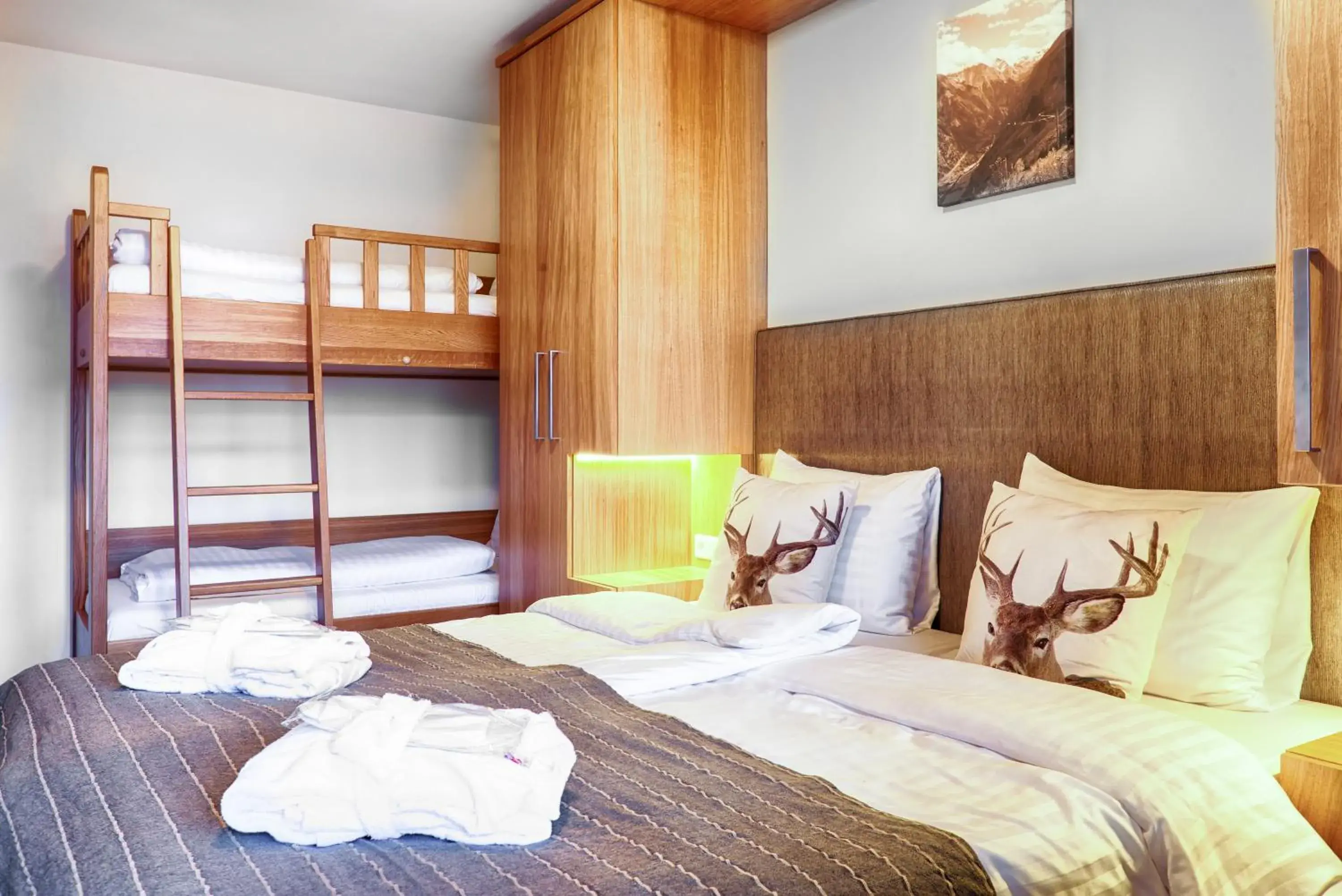 Bed in Avenida Mountain Resort by Alpin Rentals