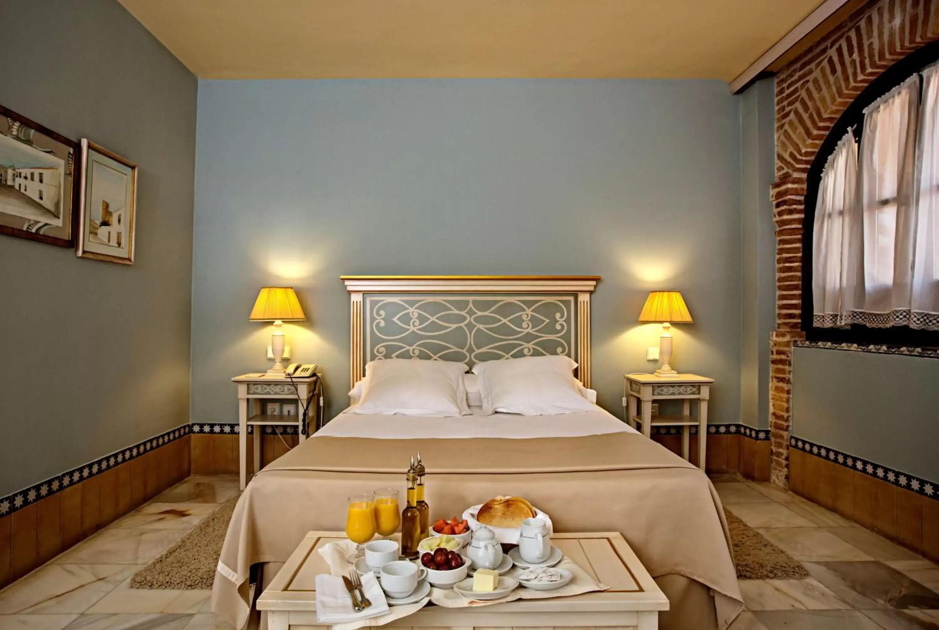 Bed in Hotel Alcázar de la Reina