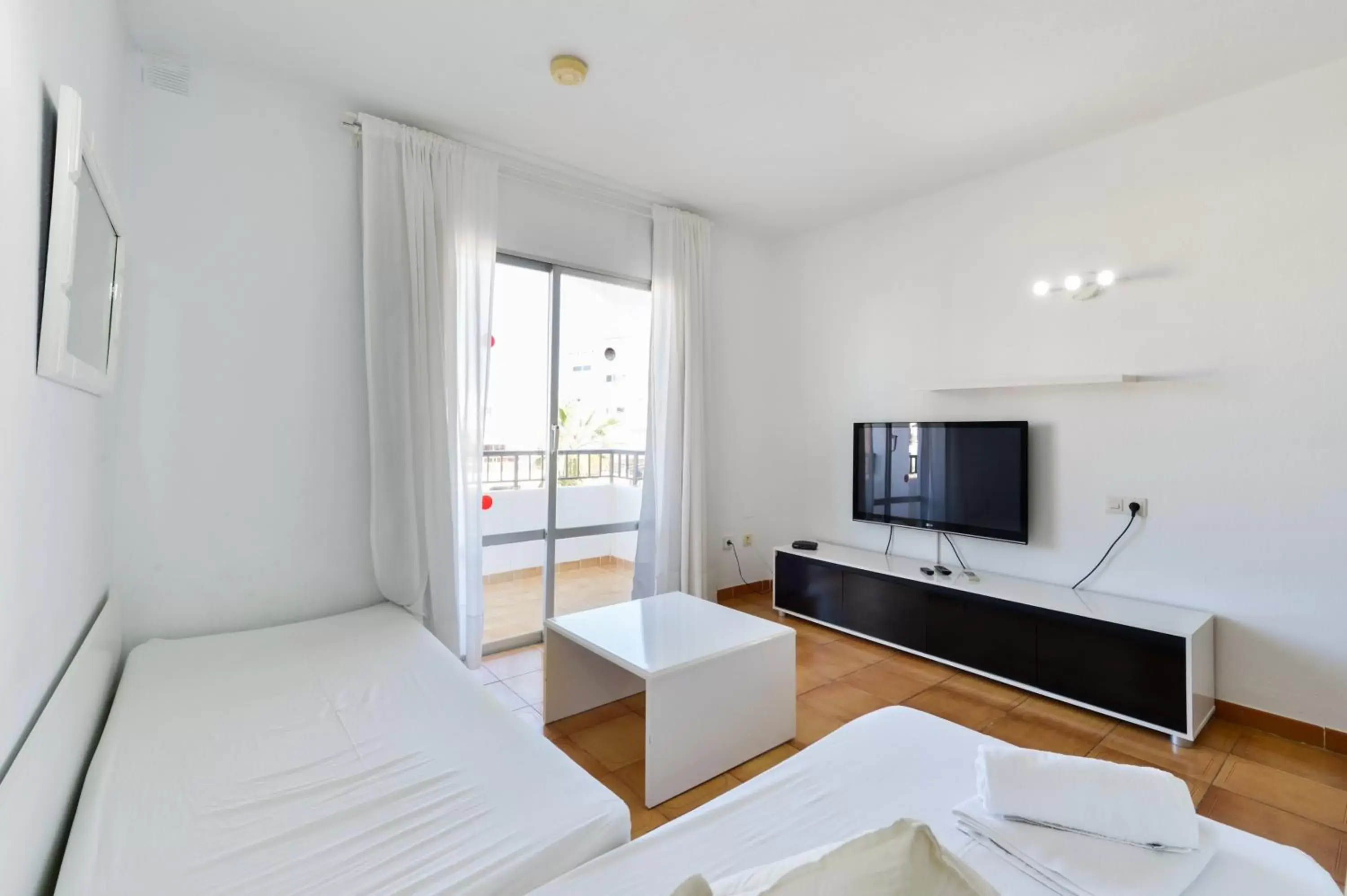 TV and multimedia, TV/Entertainment Center in Apartamentos San Antonio Beach