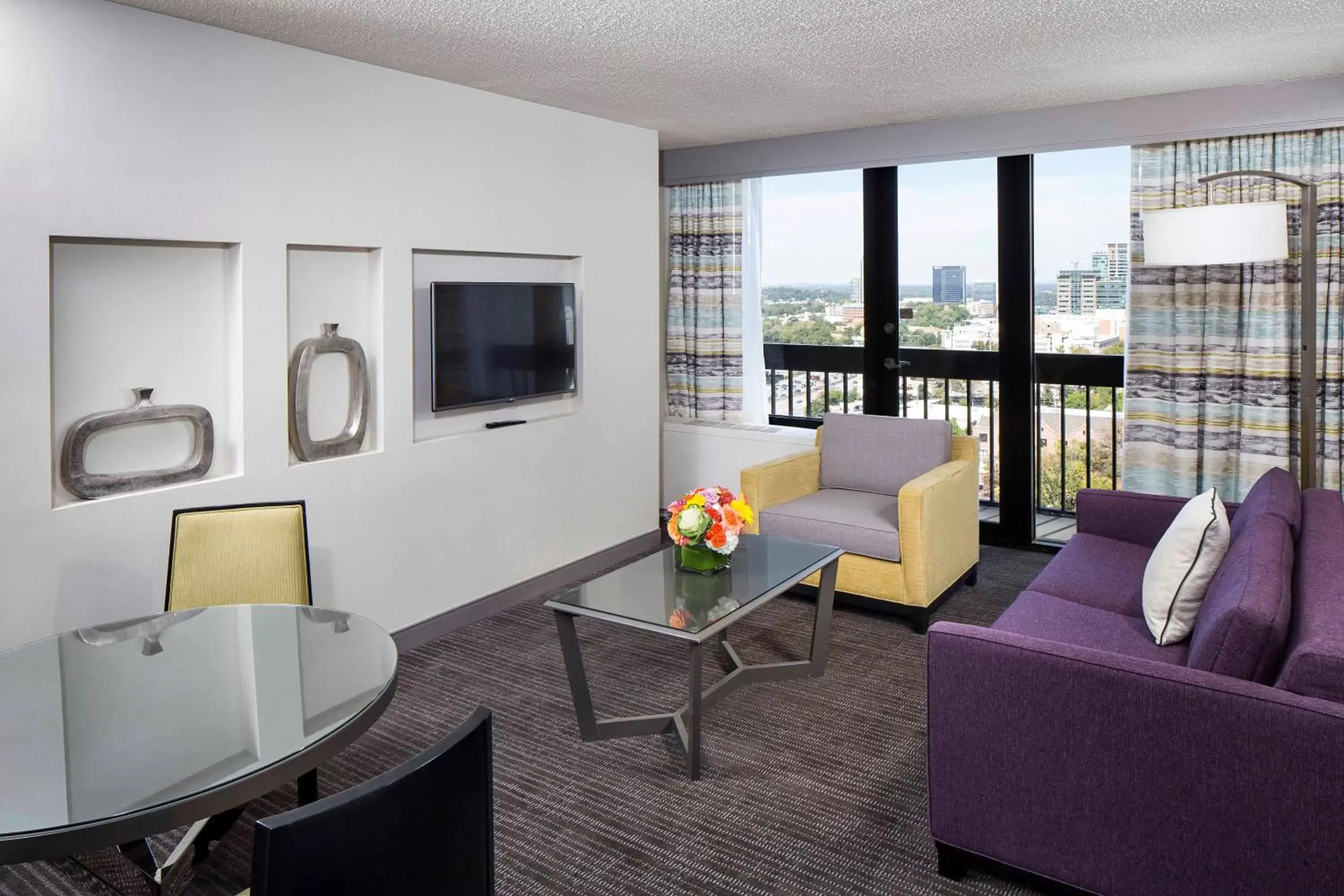 TV and multimedia, Seating Area in Crowne Plaza Atlanta Midtown, an IHG Hotel