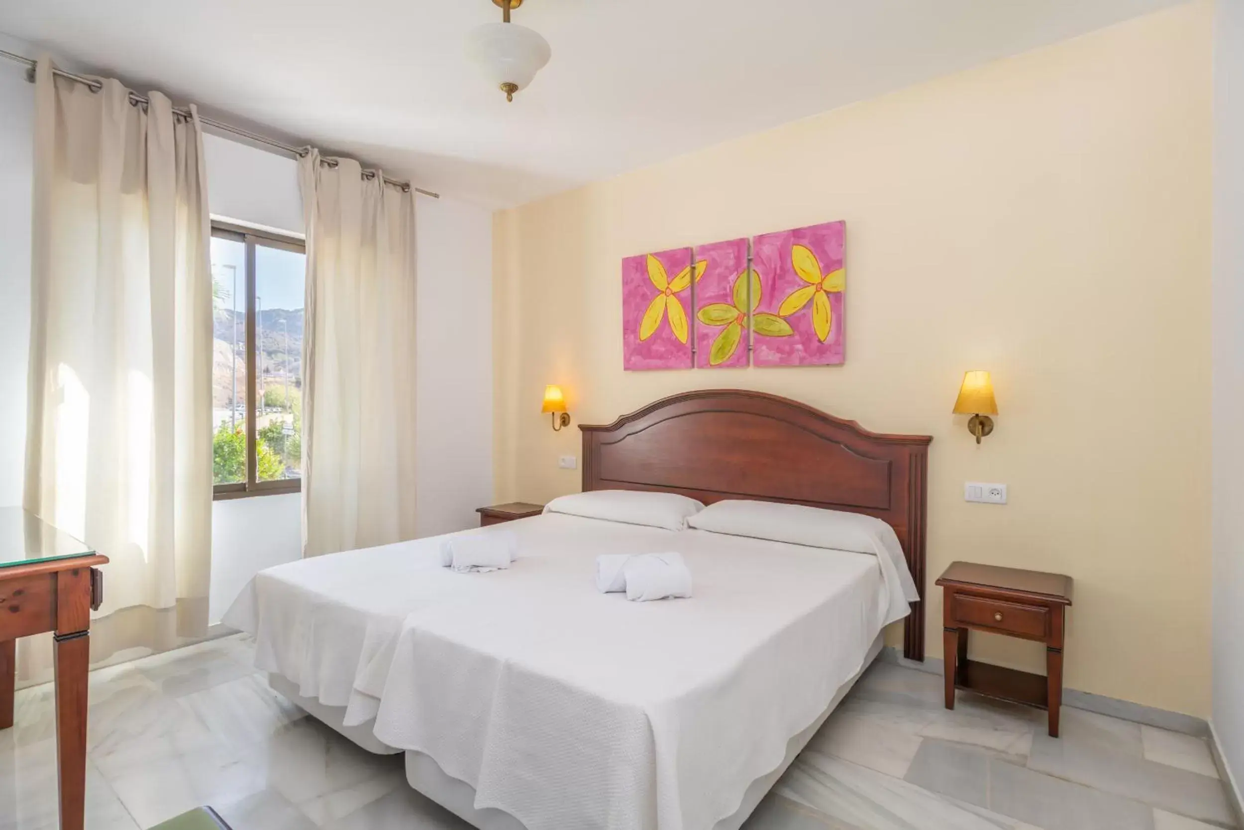 Bed in Apartahotel Playamaro by Dorobe Bed in Apartahotel Playamaro by Dorobe