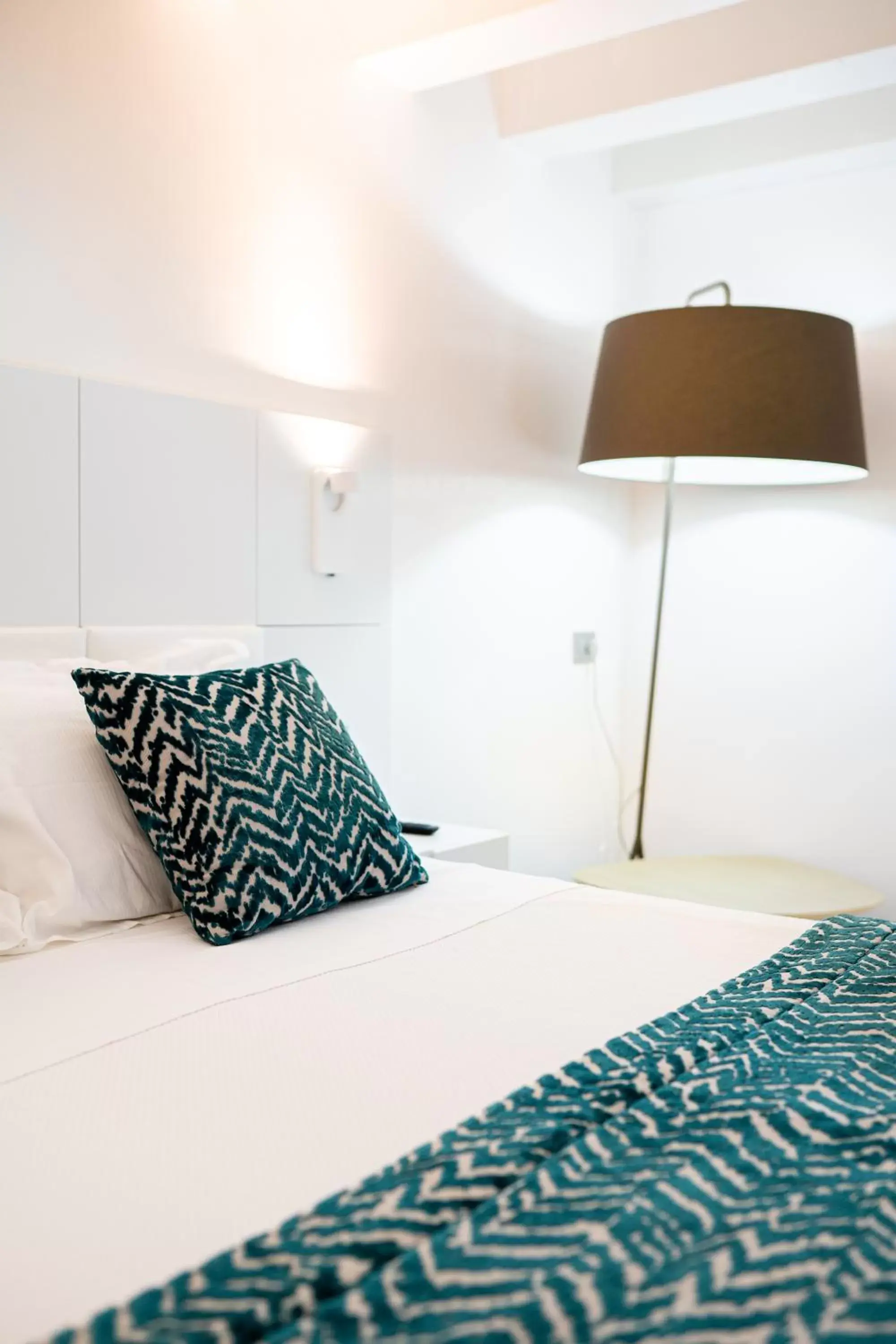 Bed in Caportigia Boutique Hotel