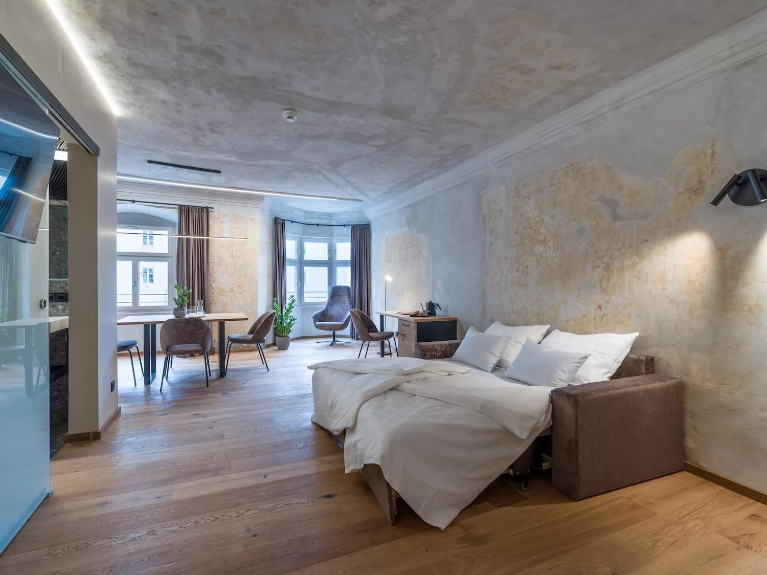 Living room, Bed in Platzhirsch Kufstein