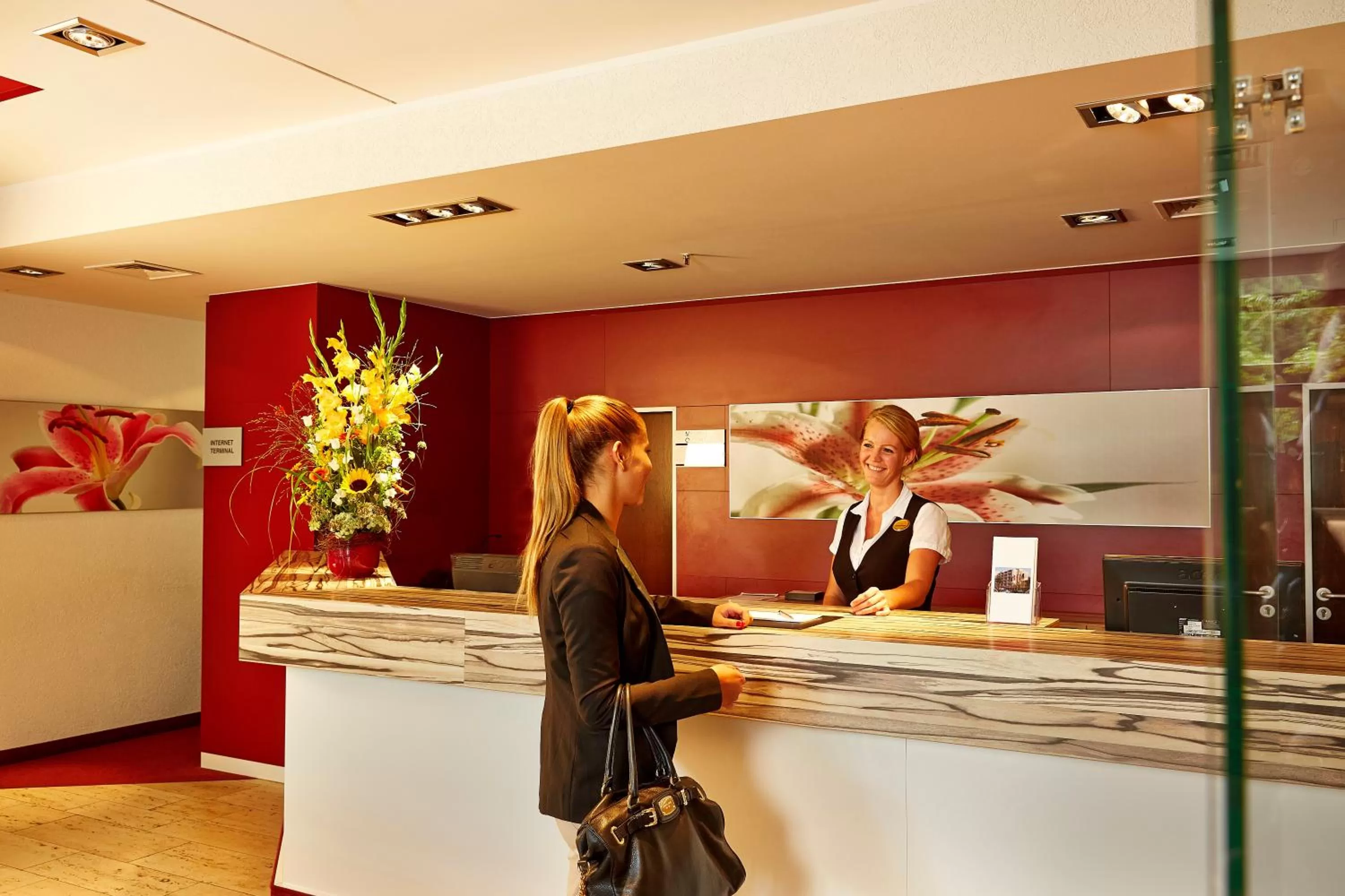 Lobby or reception in H+ Hotel Bad Soden