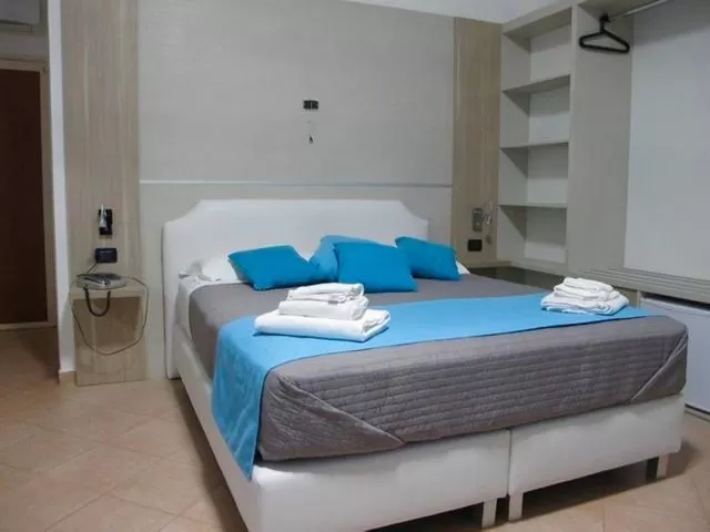 Bed in San Marco Hotel